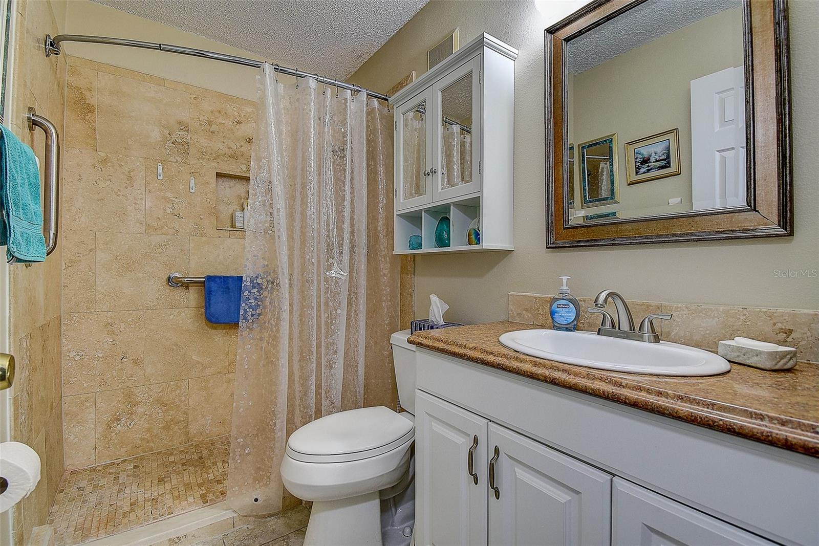 Primary Bath with extra low walk in shower