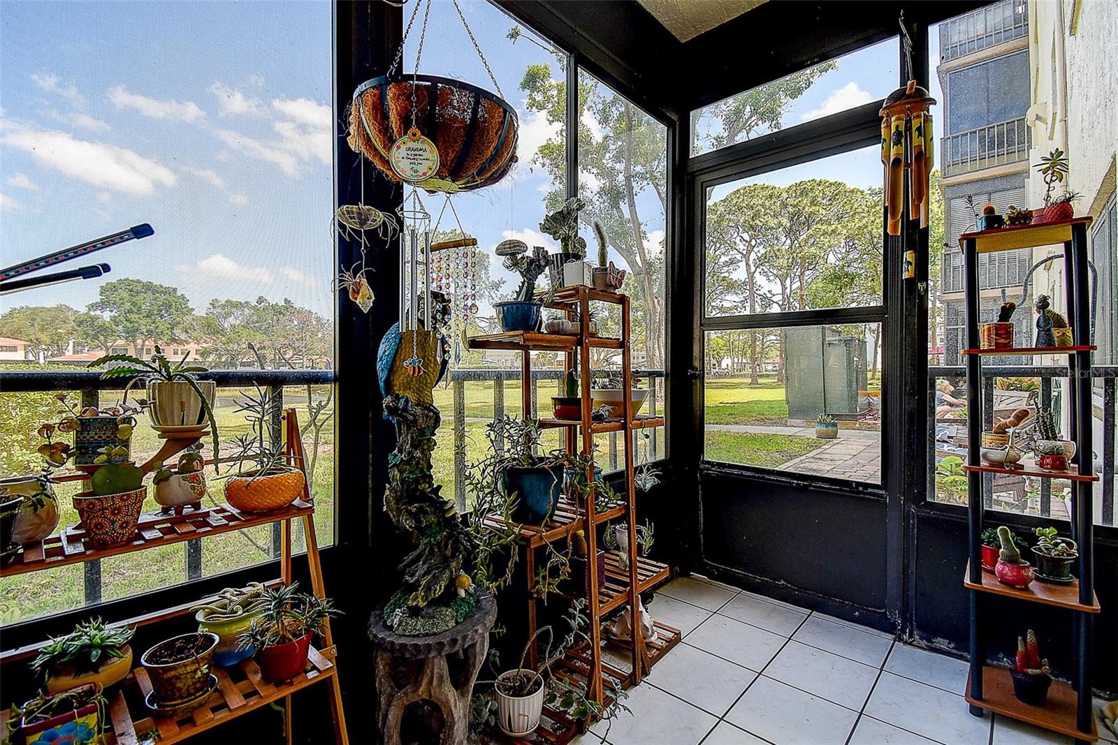 Screen room to open patio