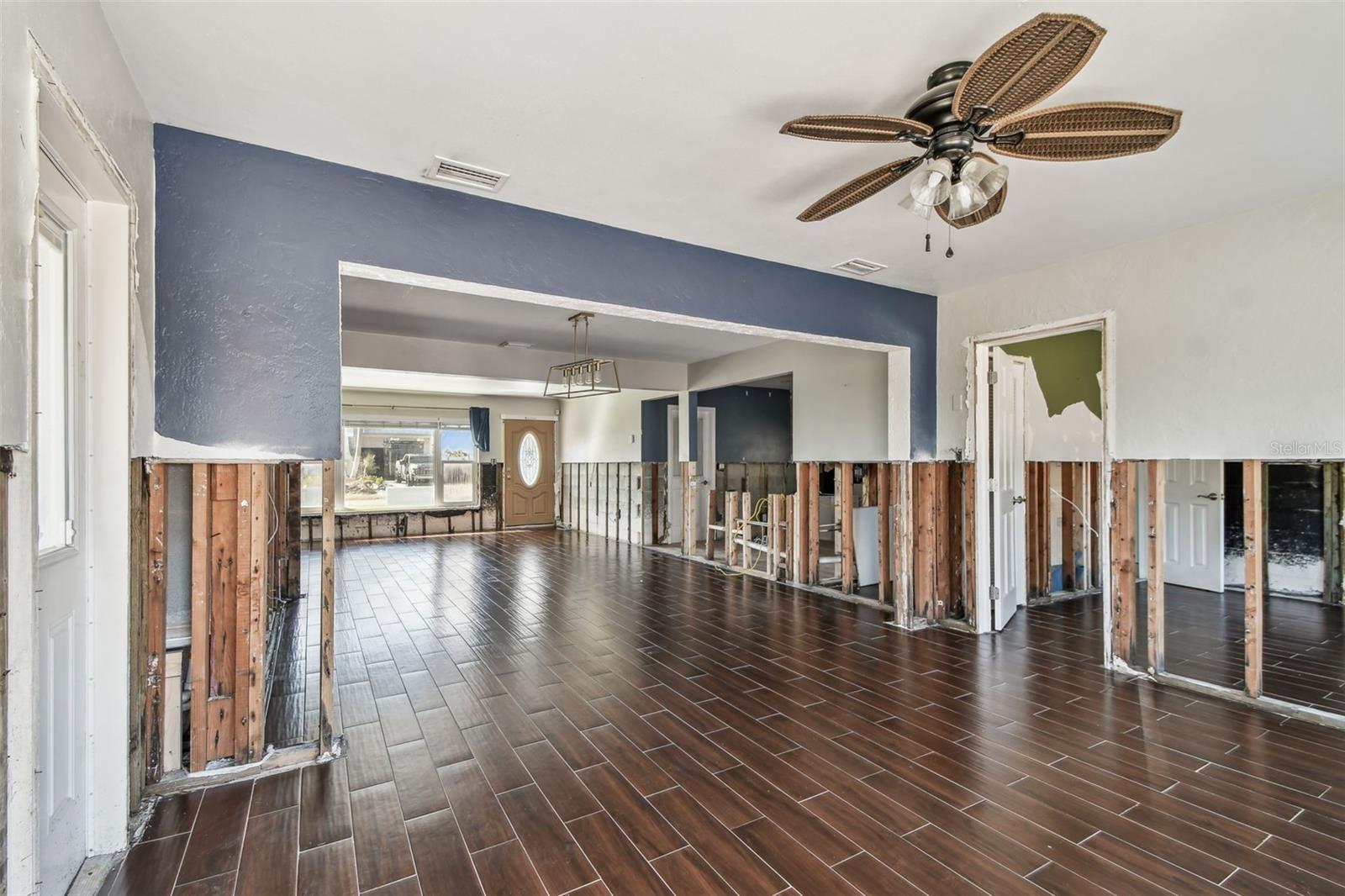 SUN ROOM LOOKING TOWARDS FRONT ENTRANCE