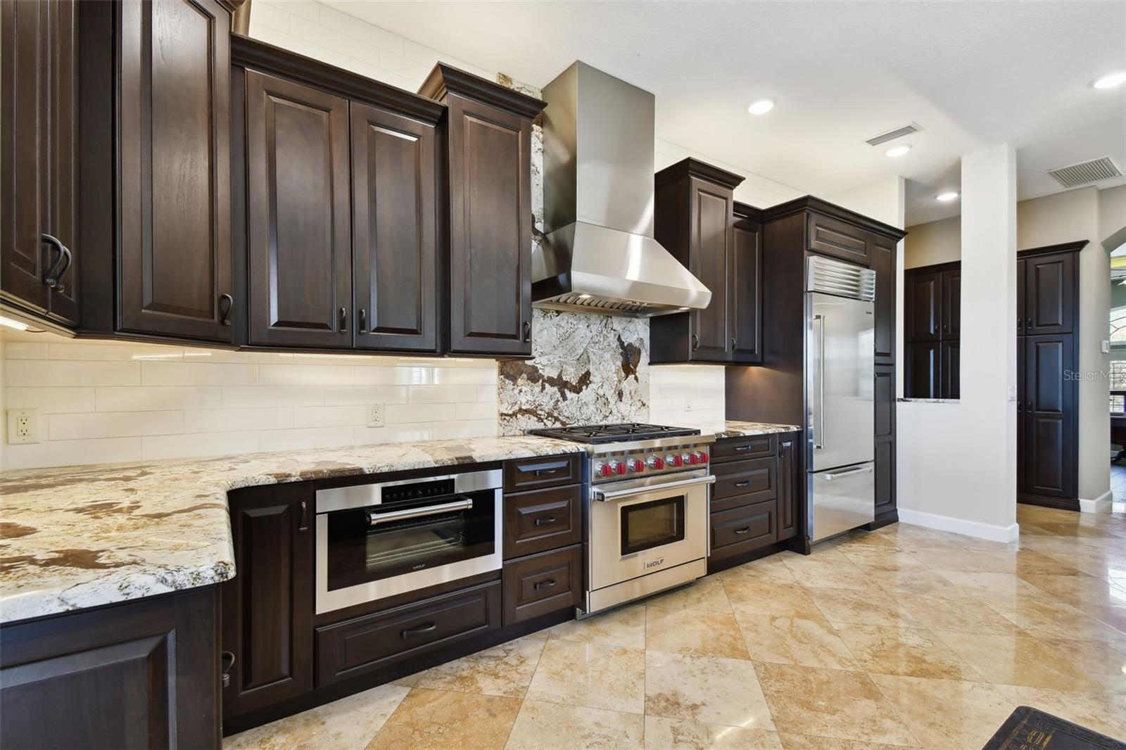 Tons of granite work space & cabinetry.  Granite