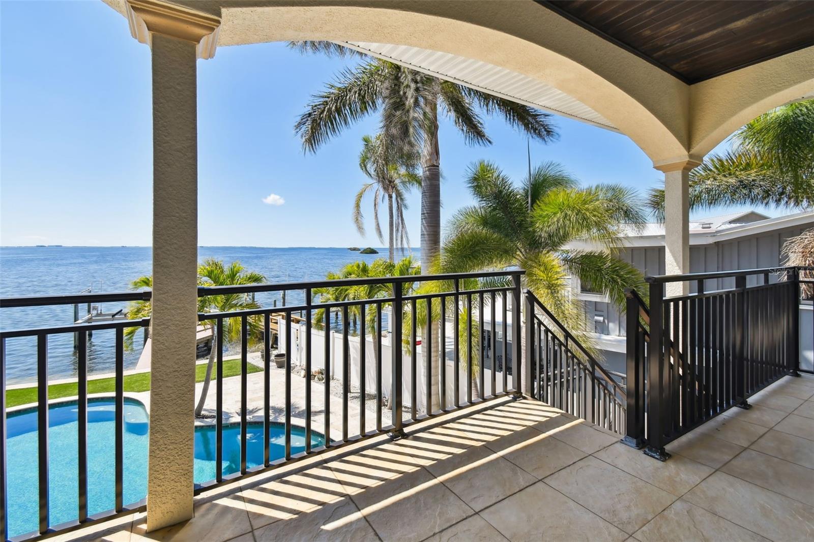 Stairway from Main Level Balcony to Pool