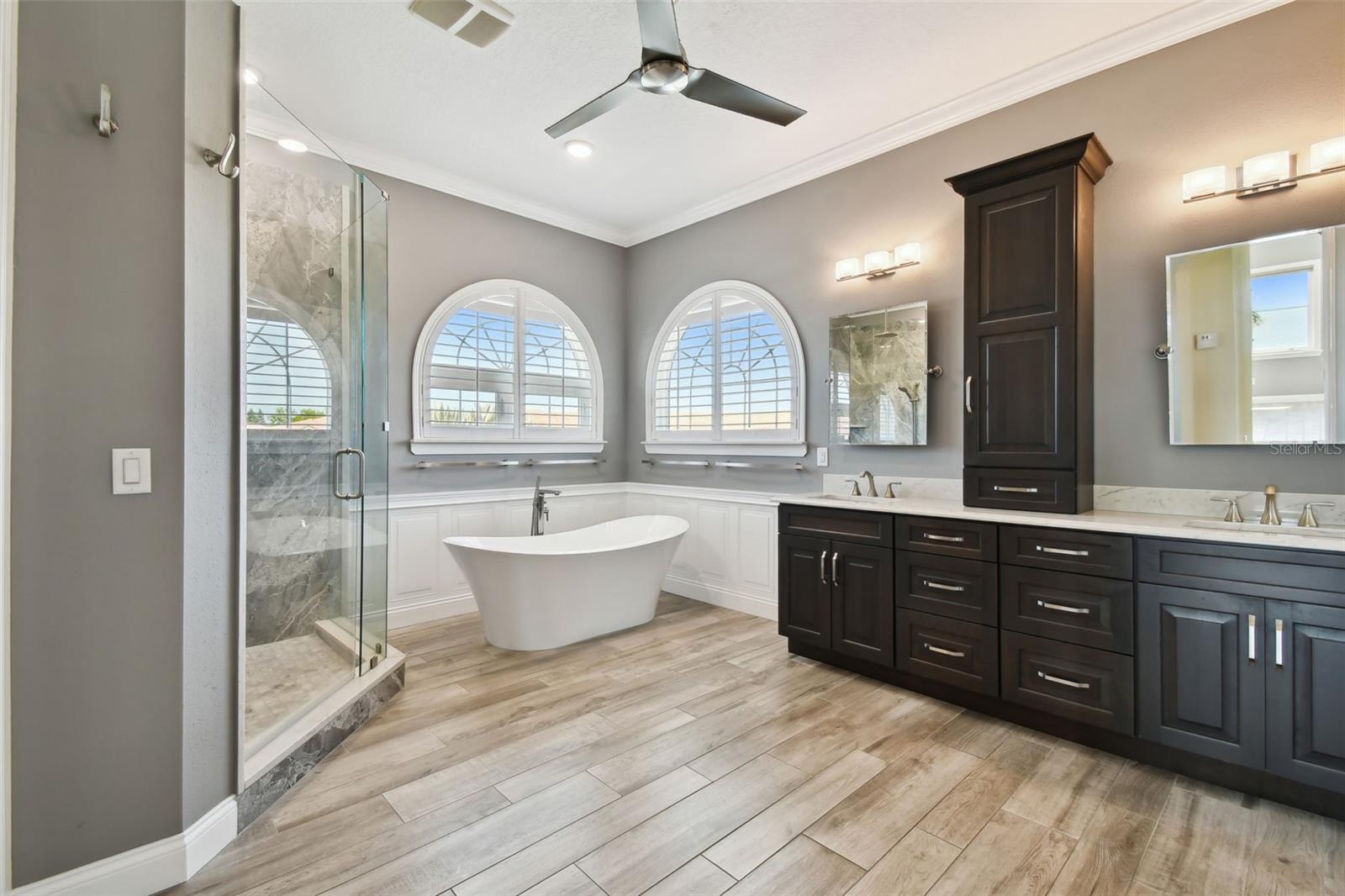 Updated Primary Bath -Cabinets are a gray stain
