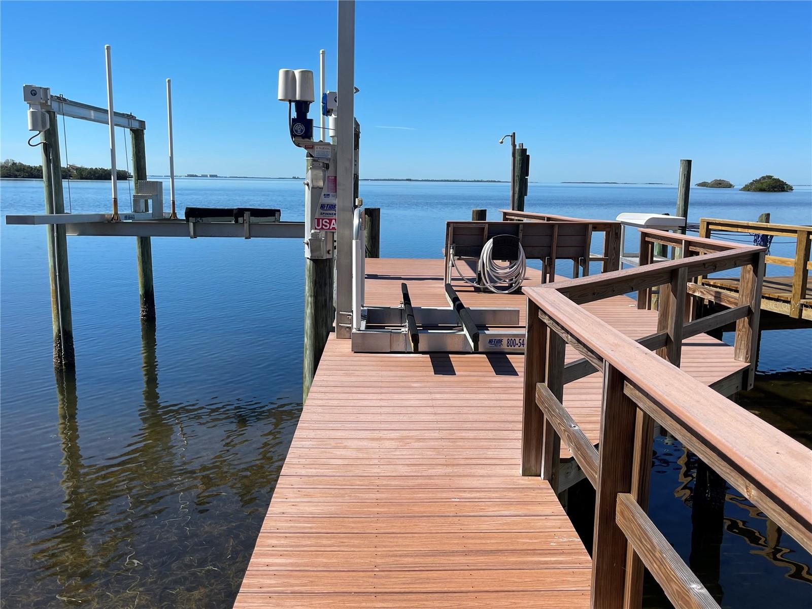 12,000# boat lift + wave-runner lift, power & water