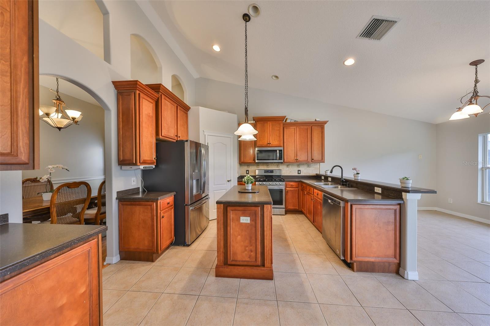 Lots of storage and a breakfast bar with room for several stools