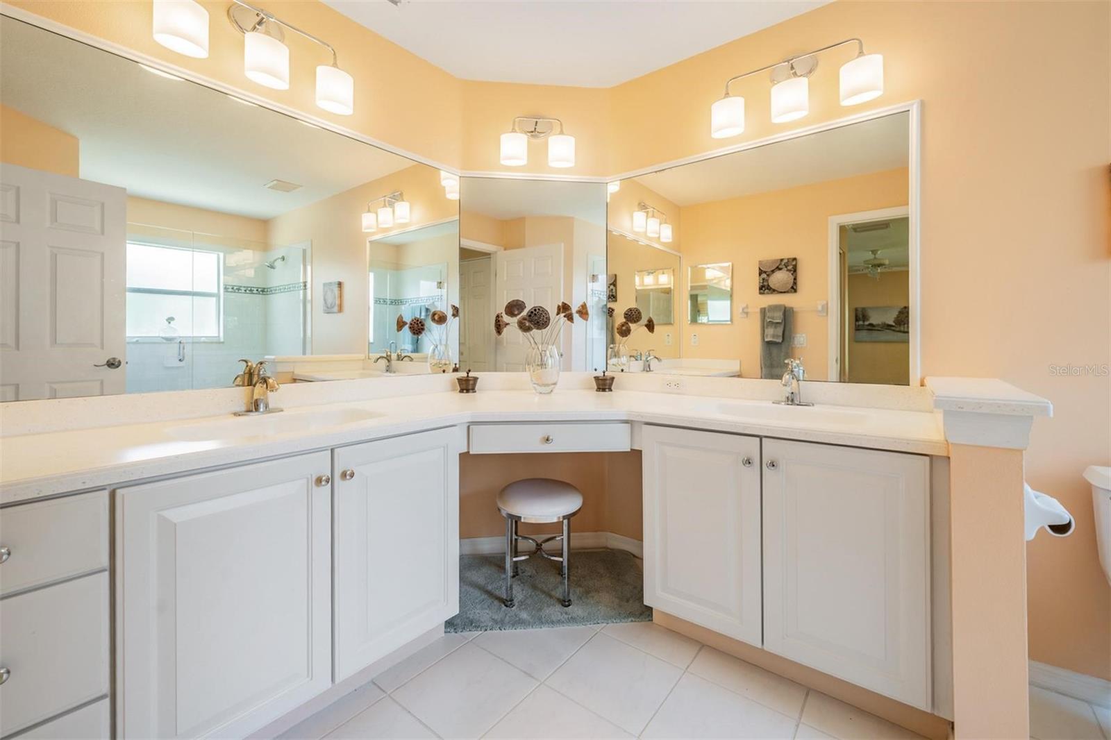 Corian countertops in the master bedroom with additional vanity storage options