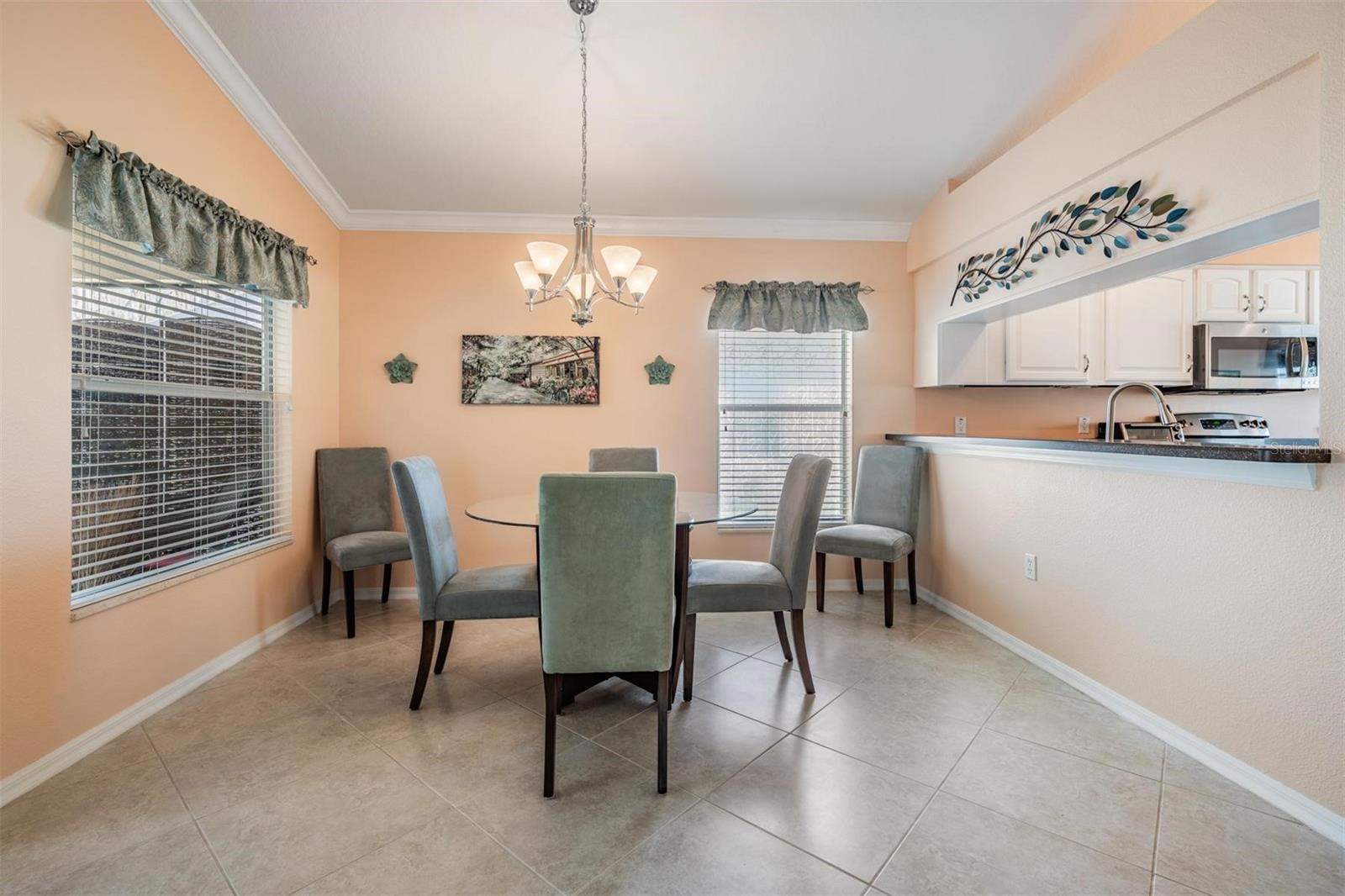 Dining area adjoins kitchen for easy serving