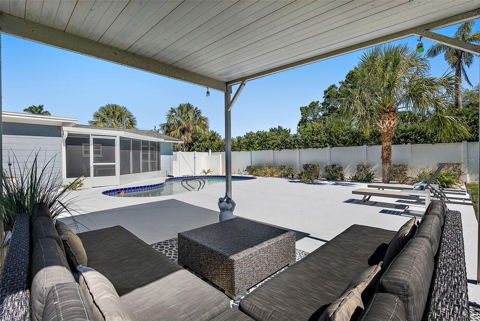 covered seating area poolside!