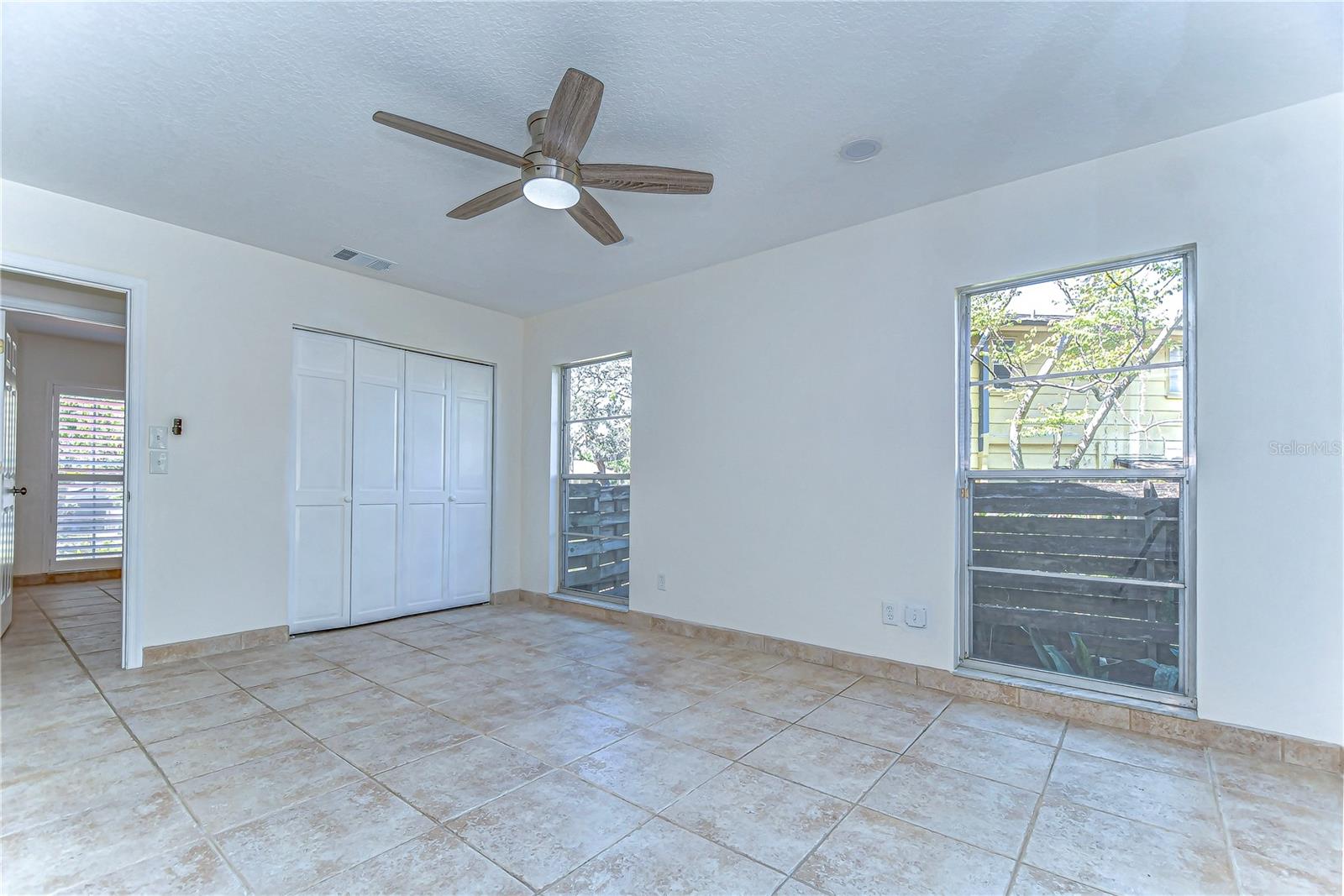 MASSIVE windows bathe the room in natural light.