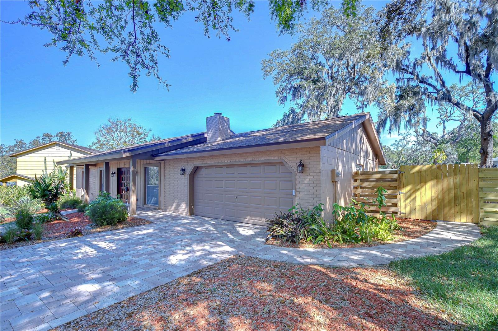 Nestled beneath the serene canopy of mature trees, this residence offers a perfect blend of tranquility and modern living, making every day feel like a retreat into nature’s embrace.