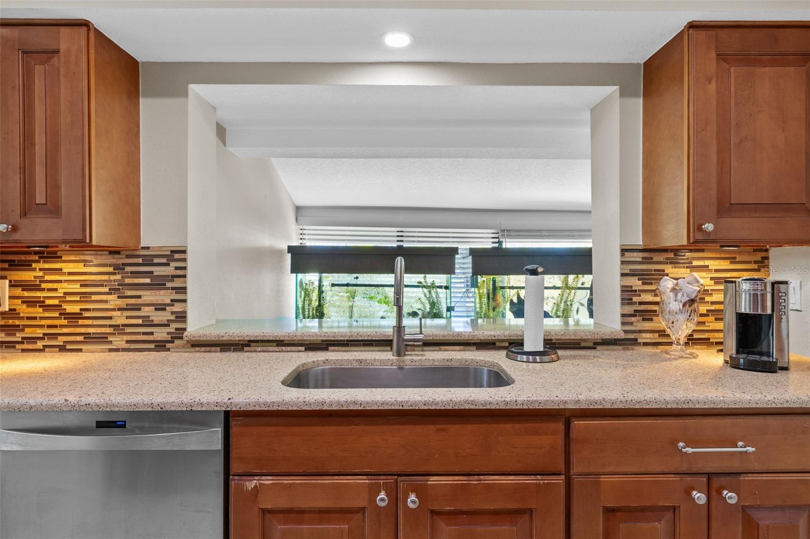 Kitchen view to bonus area window