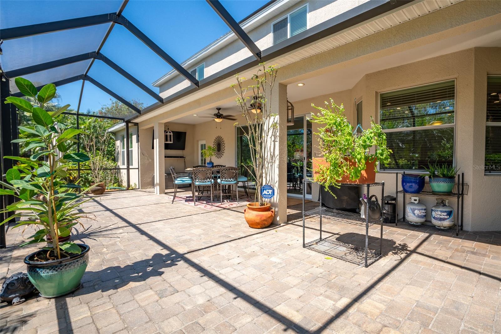 SCREENED IN LANAI COMPLETE WITH PAVERS