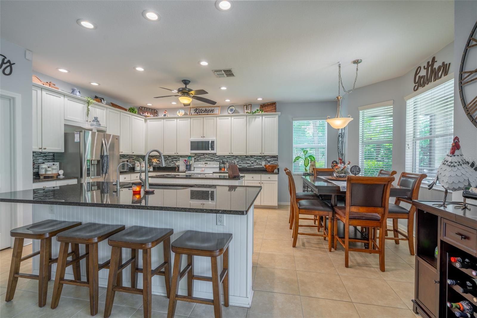 EATING SPACE IN KITCHEN W/VIEW OF BACKYARD