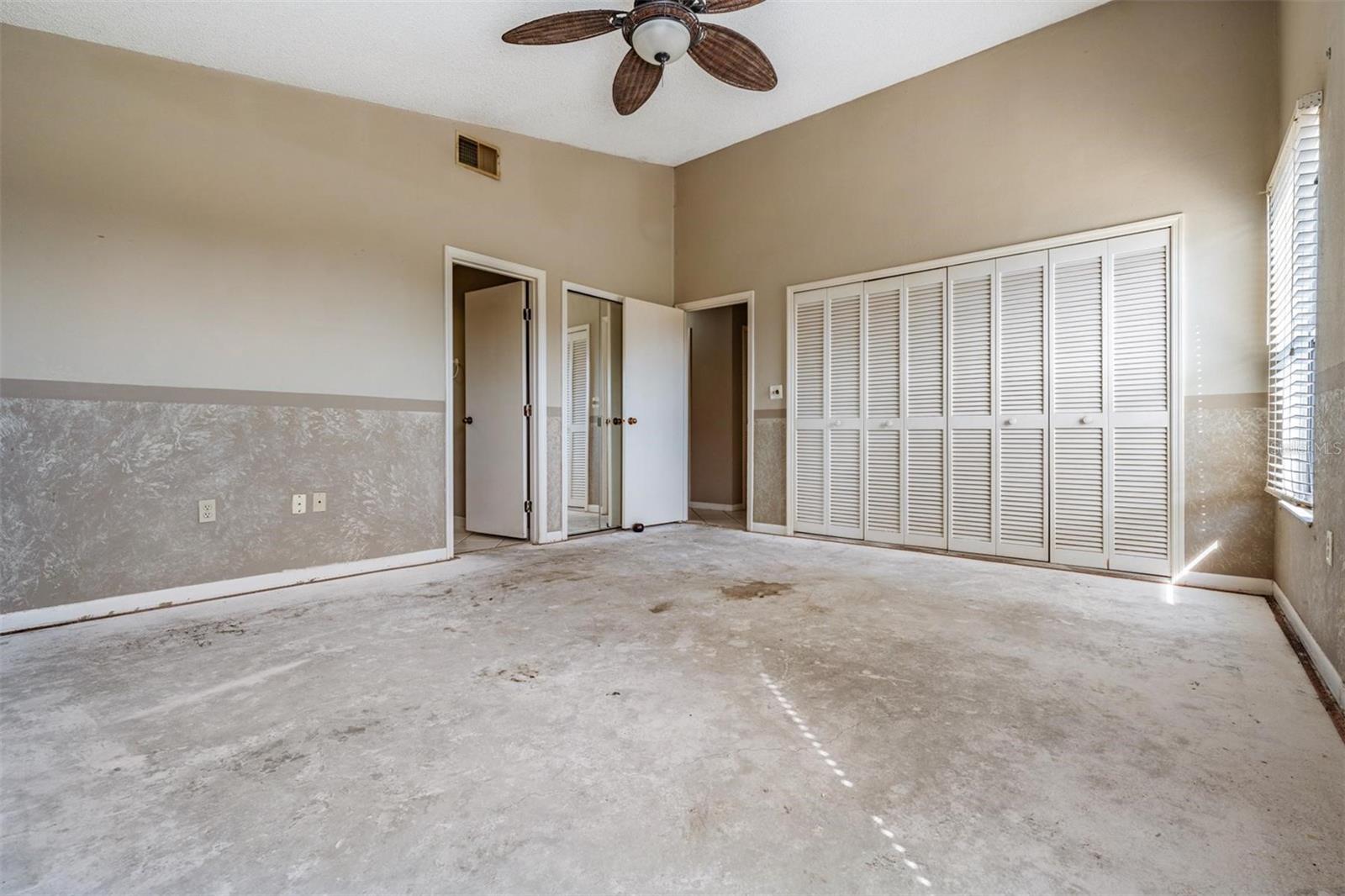 Primary bedroom with ensuite bath, walk in closet and wall closet