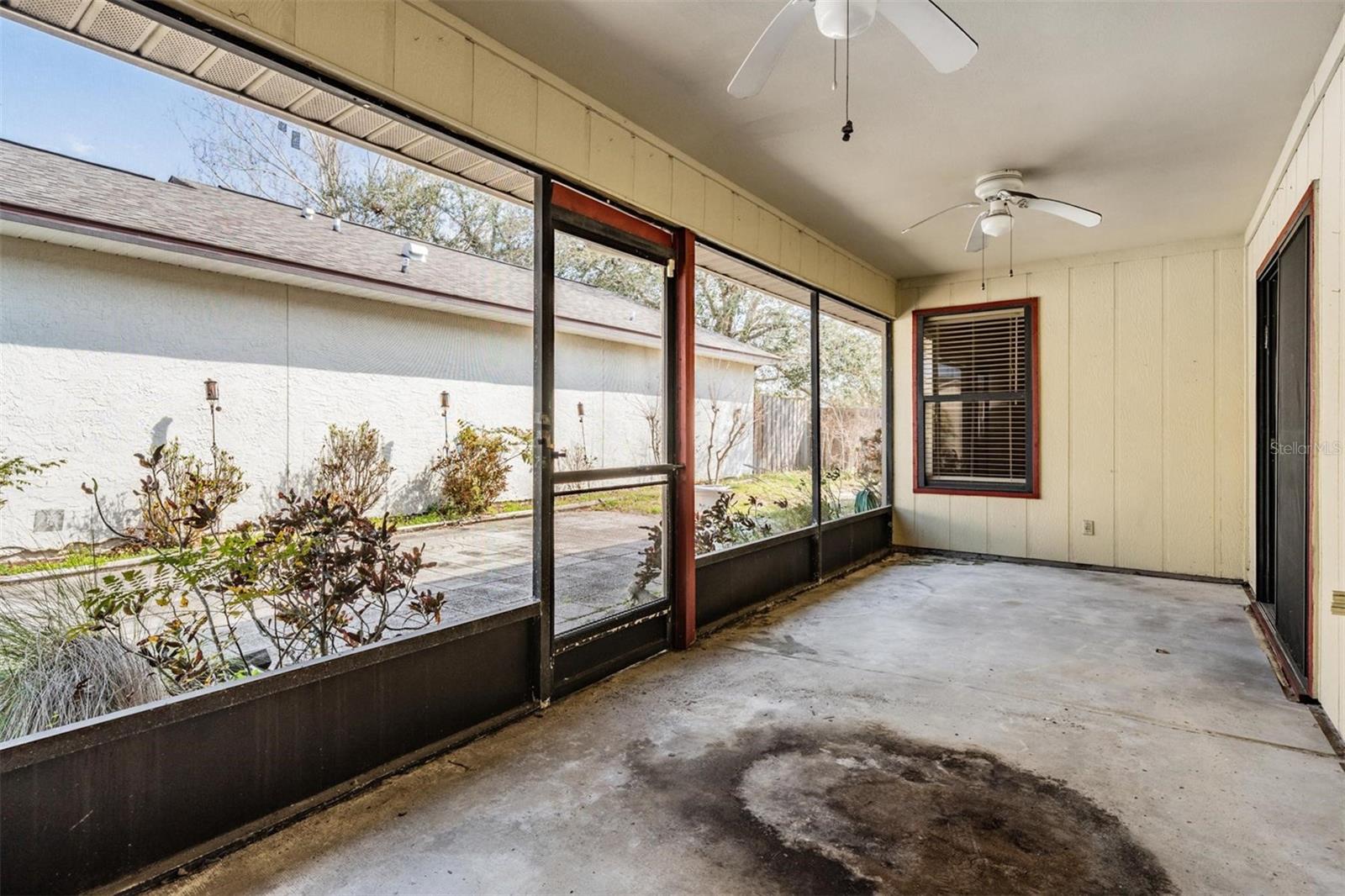 Screened-in patio with access from dining room and kitchen