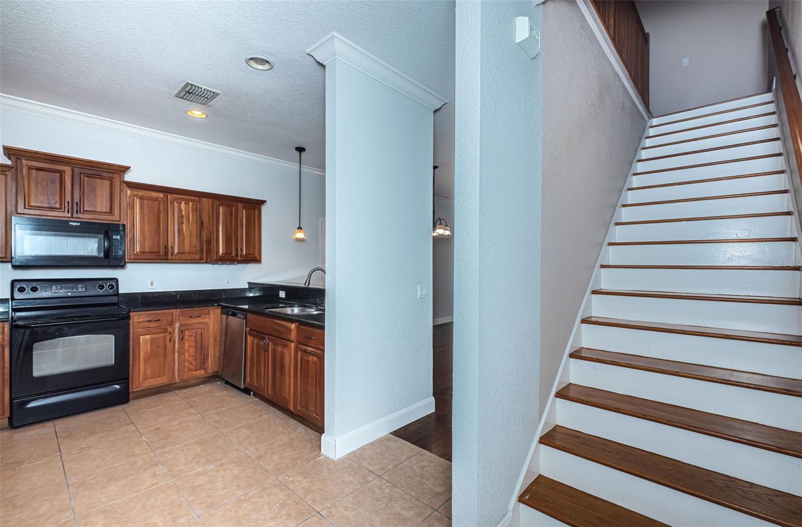 STAIRS OFF KITCHEN