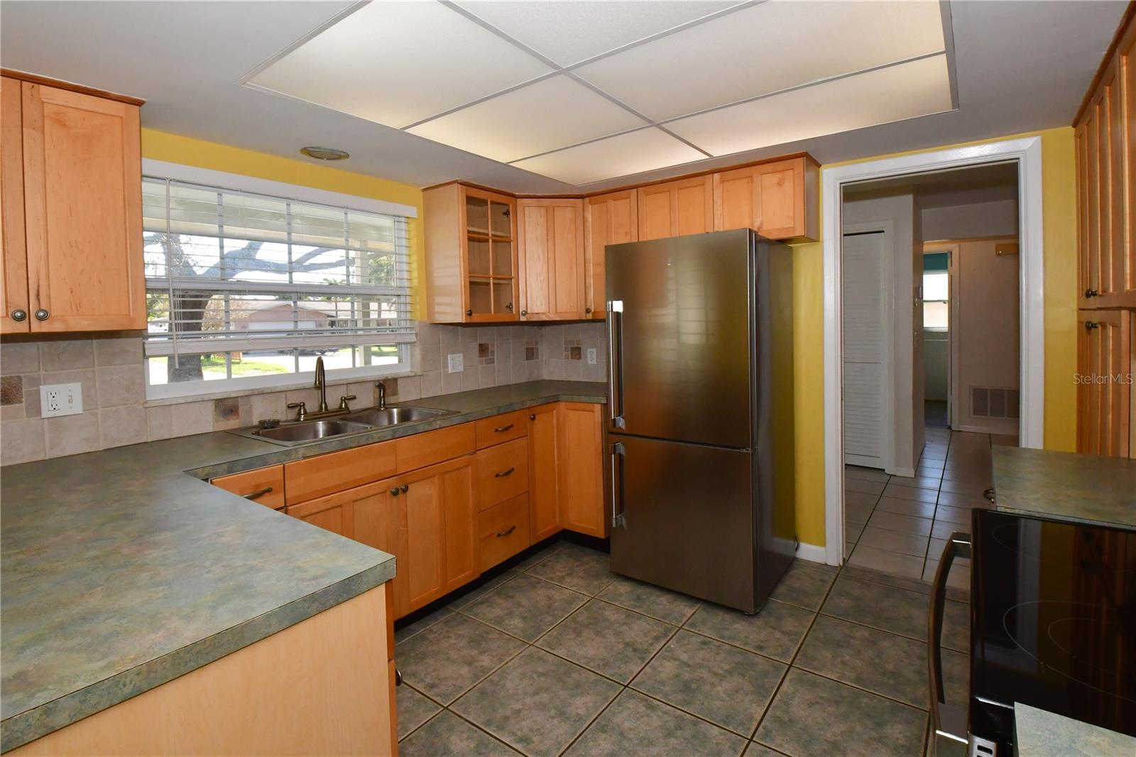 kitchen with window looking out to the front of the home