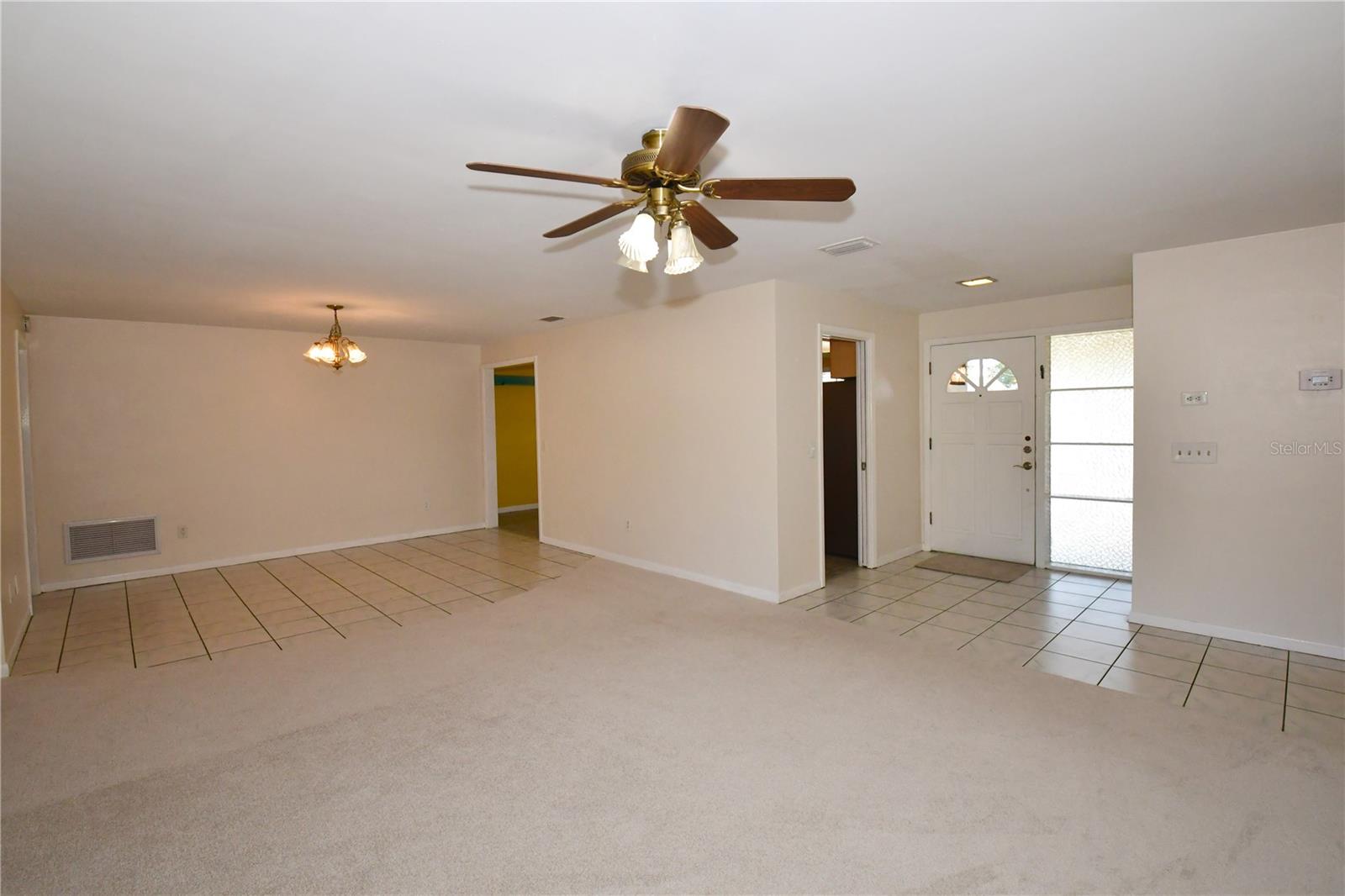 Foyer dining room and living area