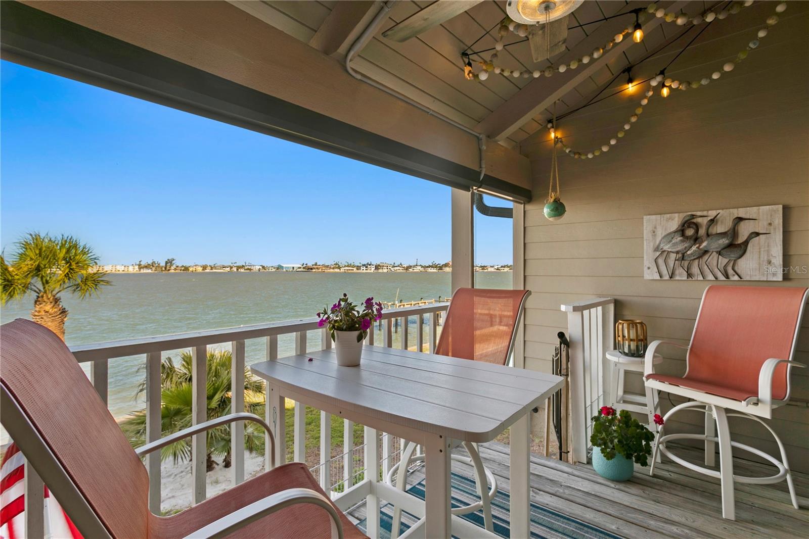 Veranda with Stairs leading down to Outdoor Area