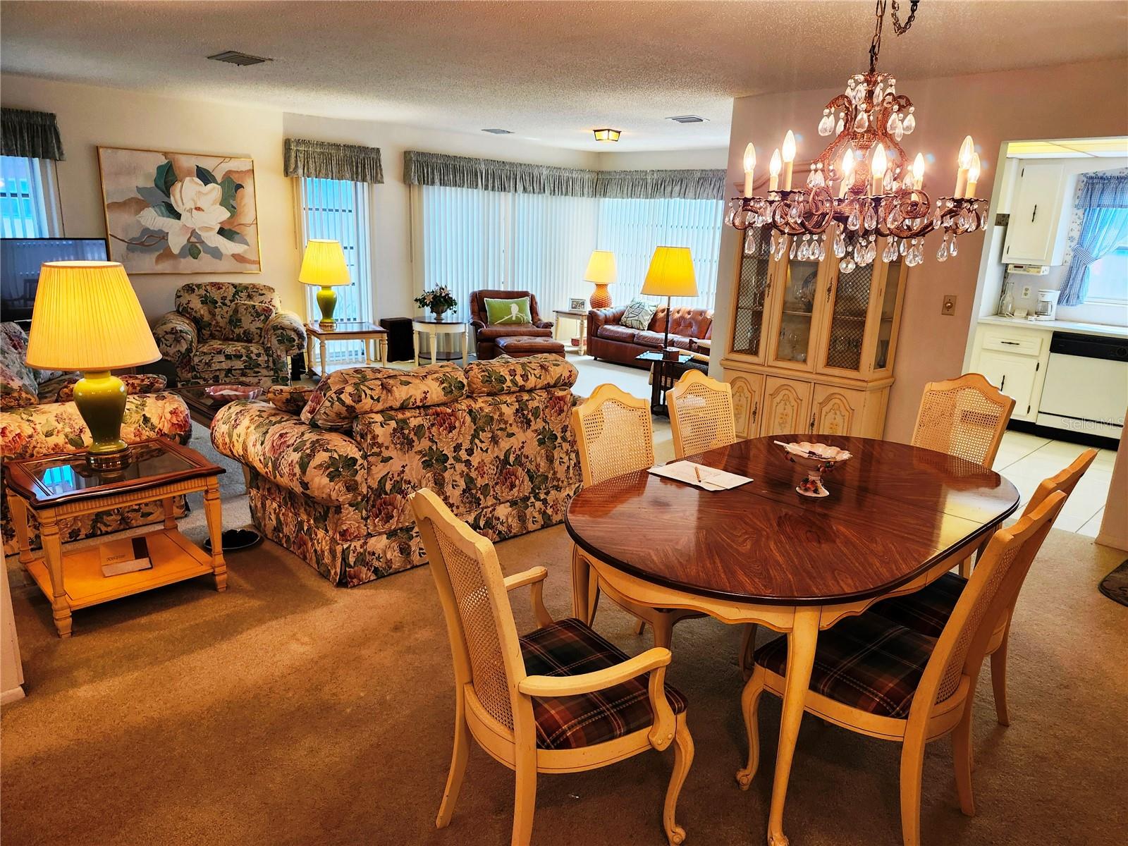 Looking from Front Door Entryway to Dining Area, Living Room, Kitchen and Florida Room