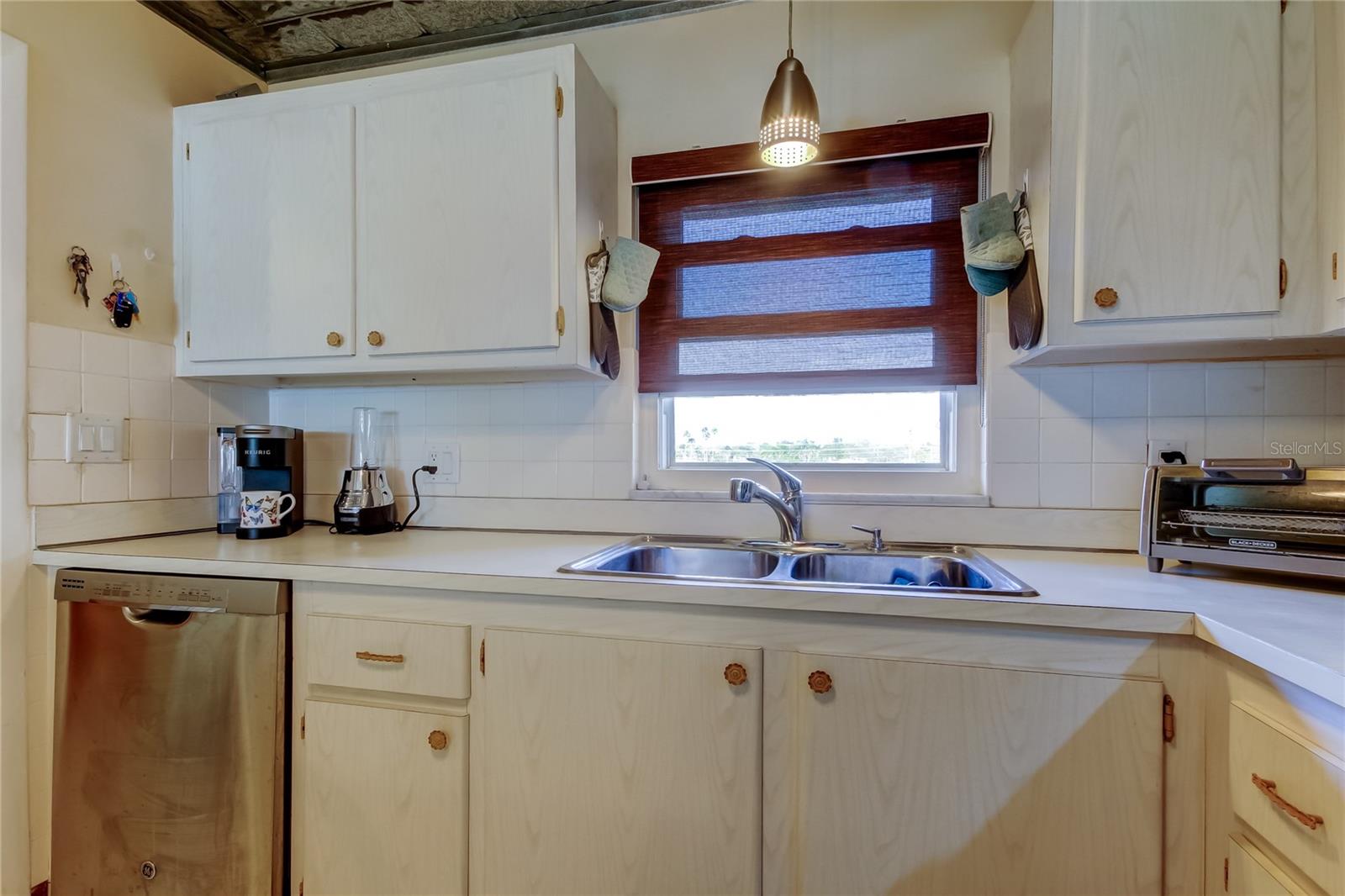 The kitchen windows adds nice natural light