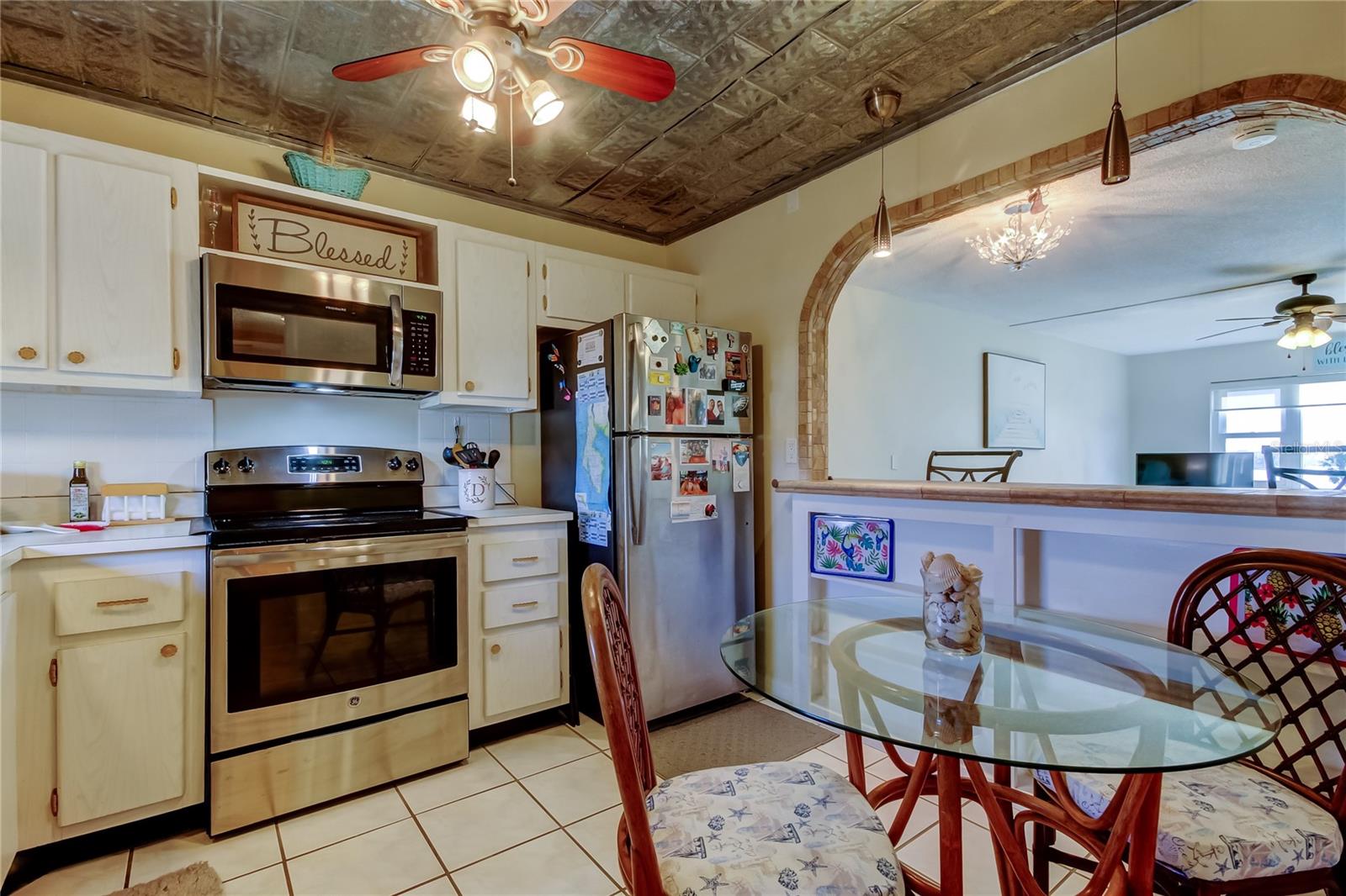 The large pass through opens this kitchen up and the Lumidome has been removed with a stylish tin ceiling