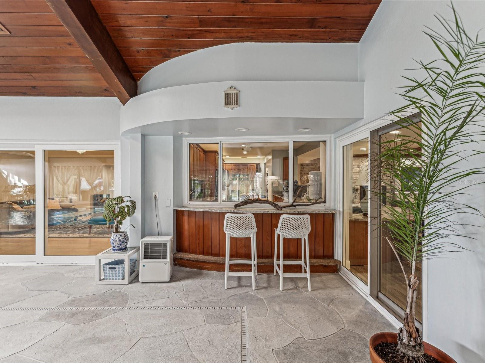 Bar with Pass Through to the Kitchen