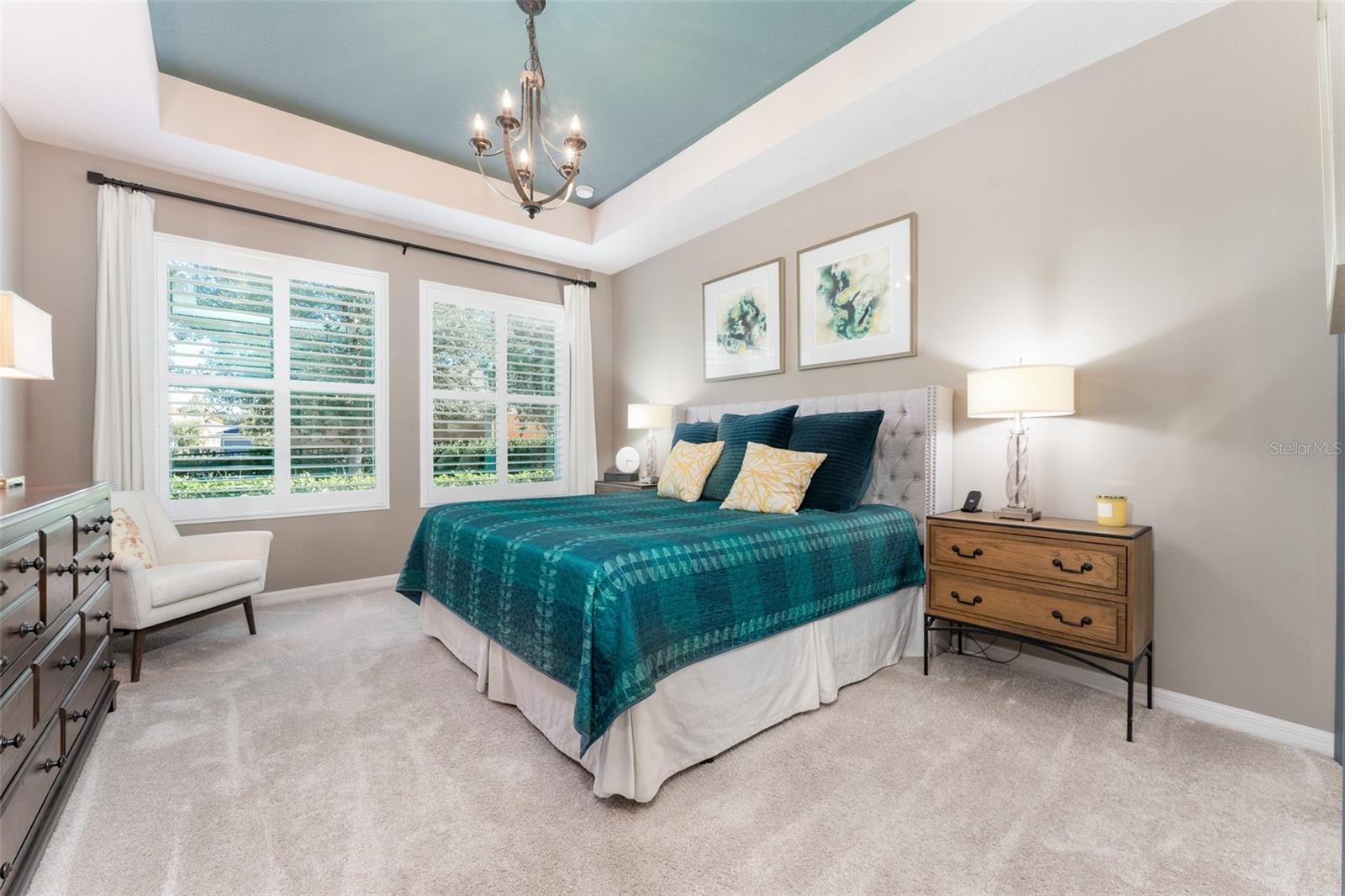 Primary Suite with Coffered Ceiling with Accented Paint