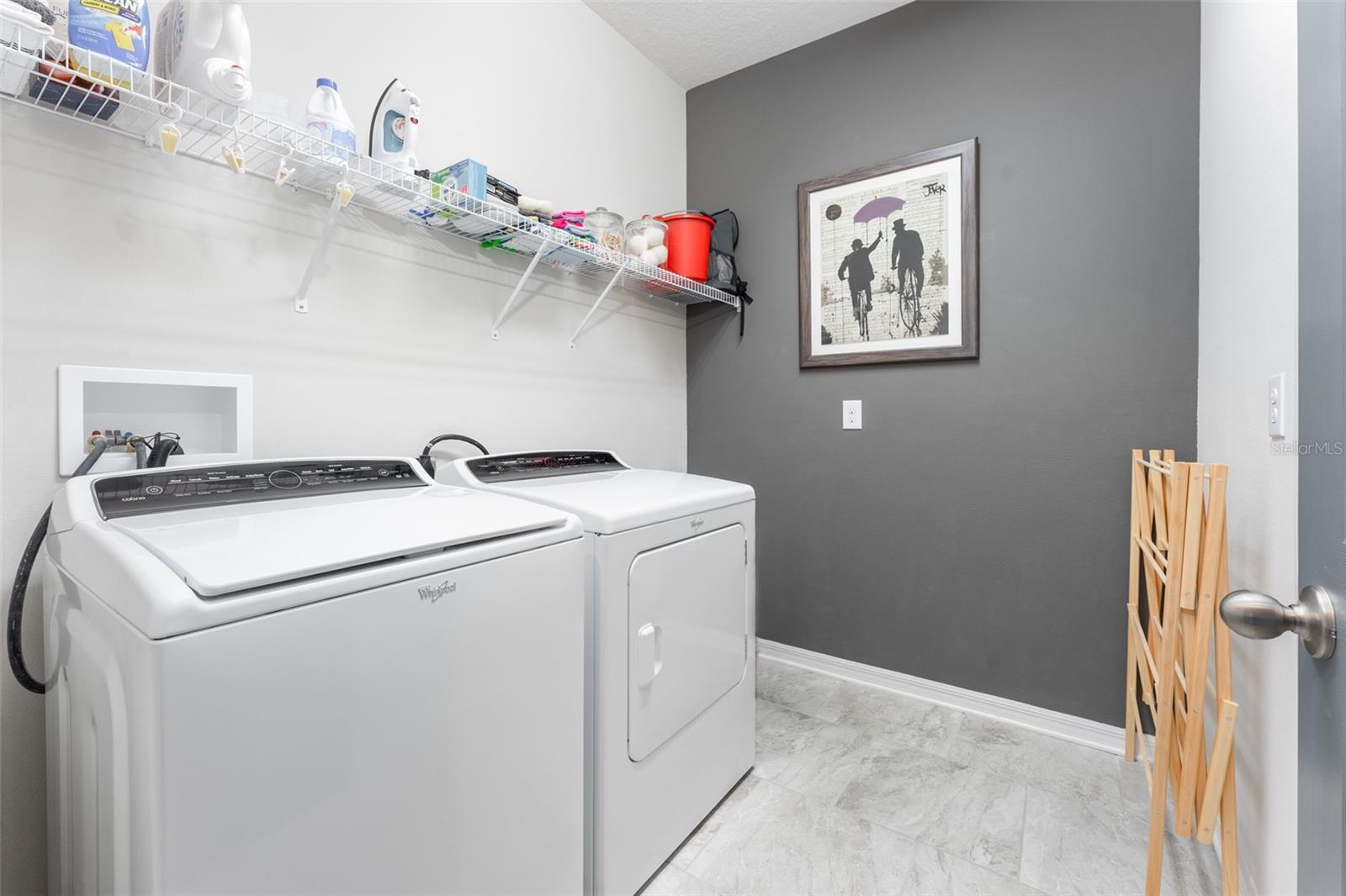 Laundry Room with Washer & Dryer That Convey