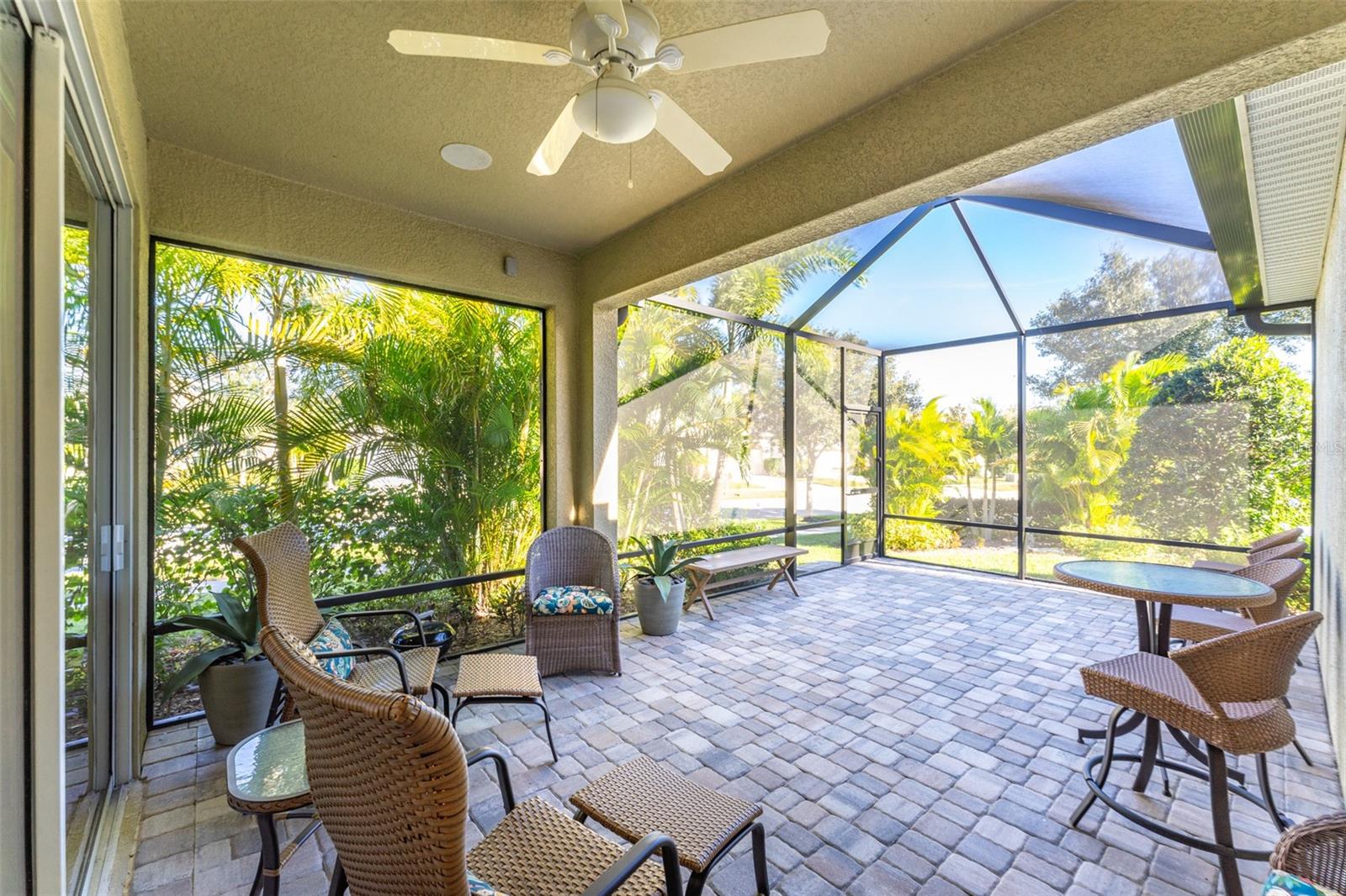 Private Covered Outdoor Living Space with Pretty Landscaping for Privacy