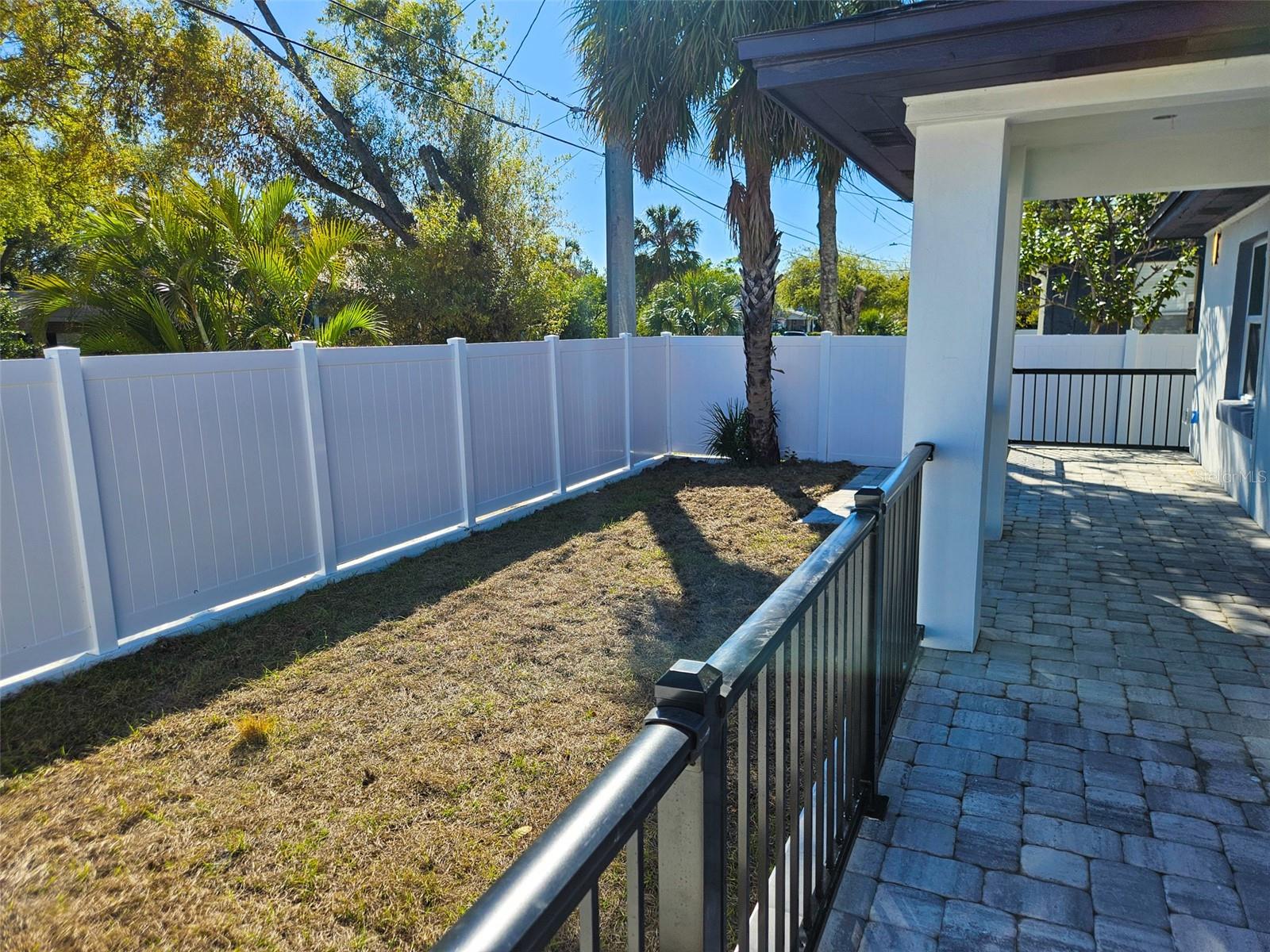 Fenced-In Yard with Wraparound Porch