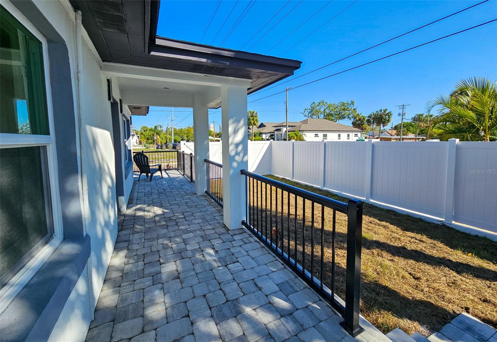 Fenced-In Yard with Wraparound Porch