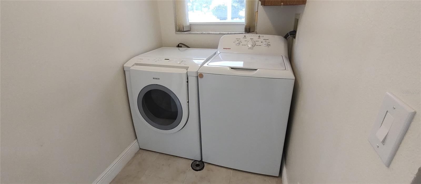 In unit new Bosch washer, vented dryer.