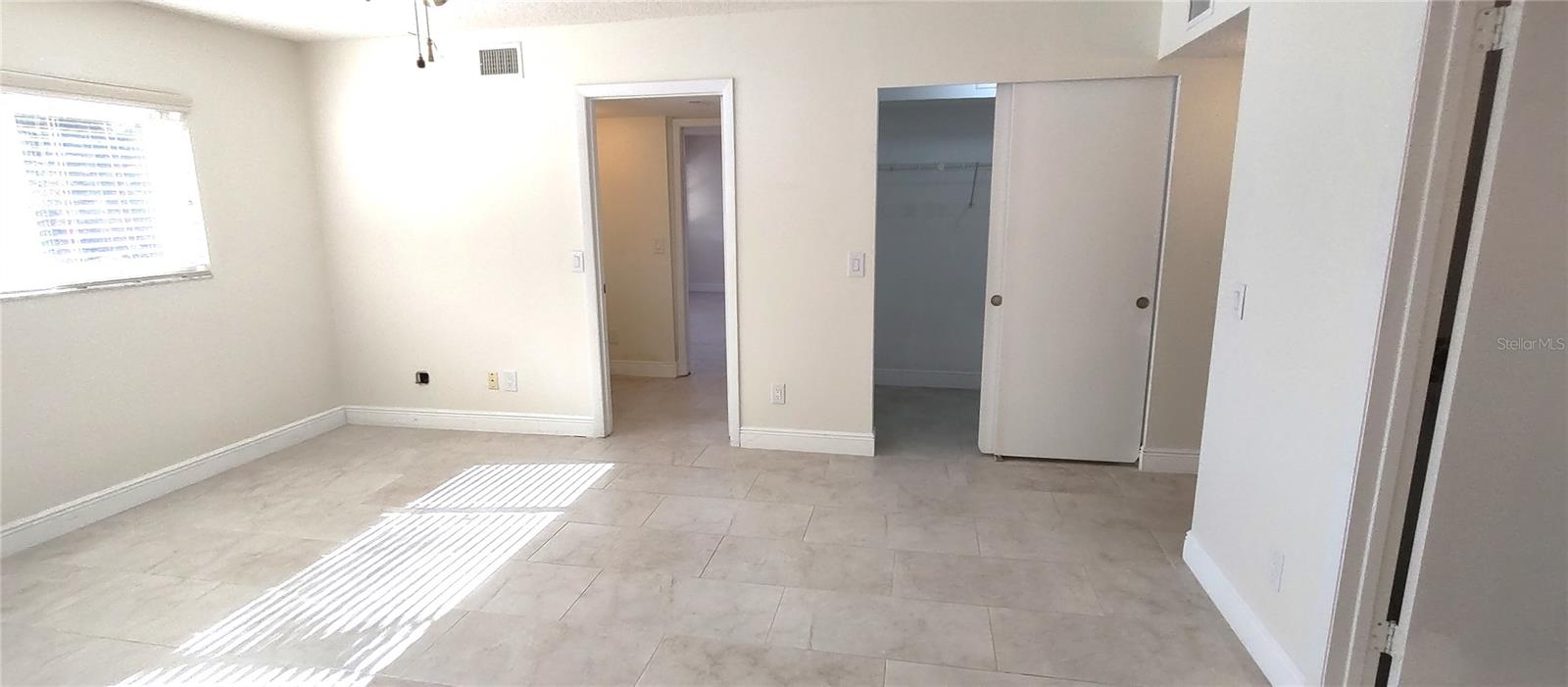 Convenient access to large wask-in closet, laundry room, and kitchen.