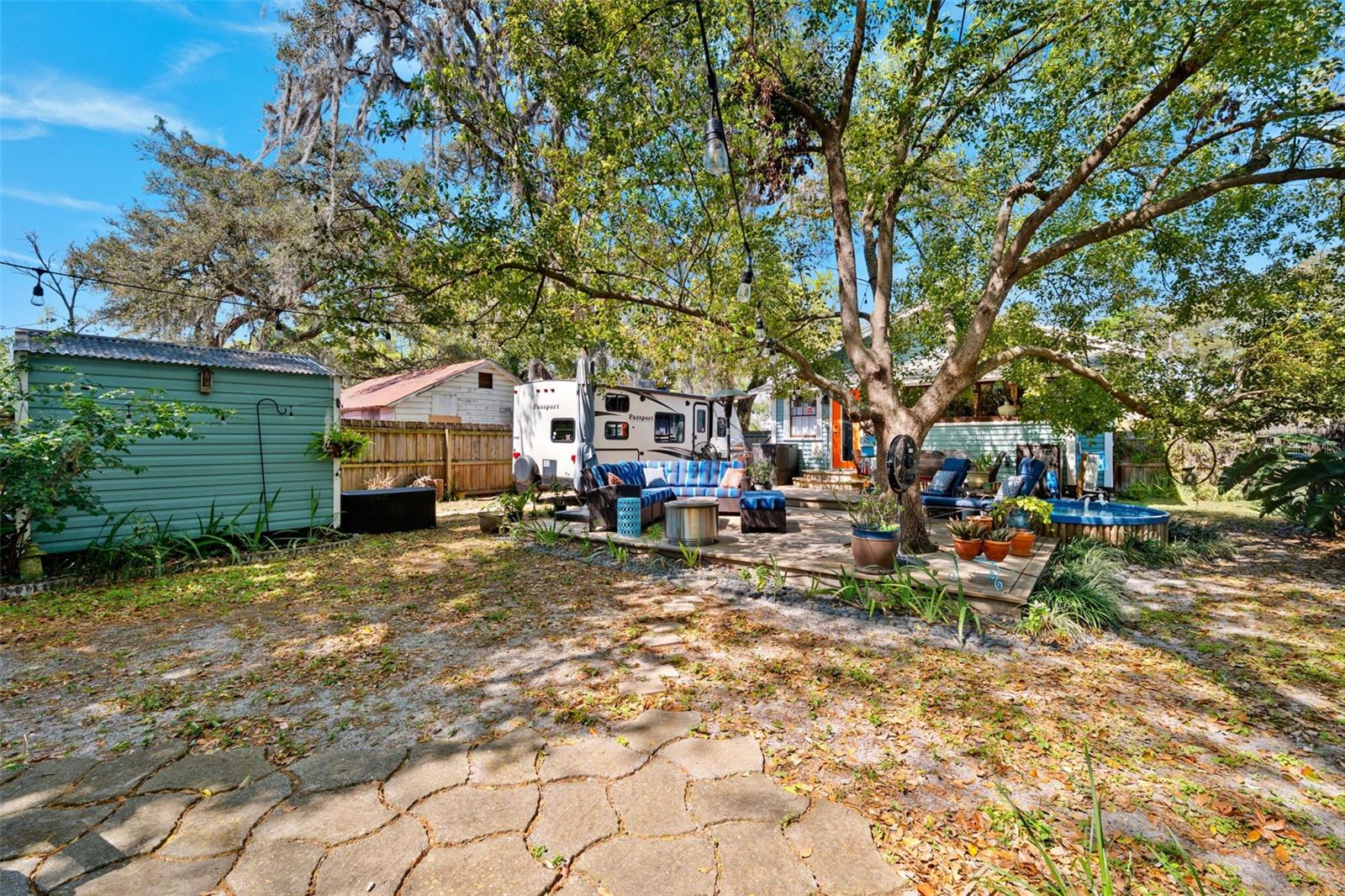 Entertain under the dappled shade of mature trees