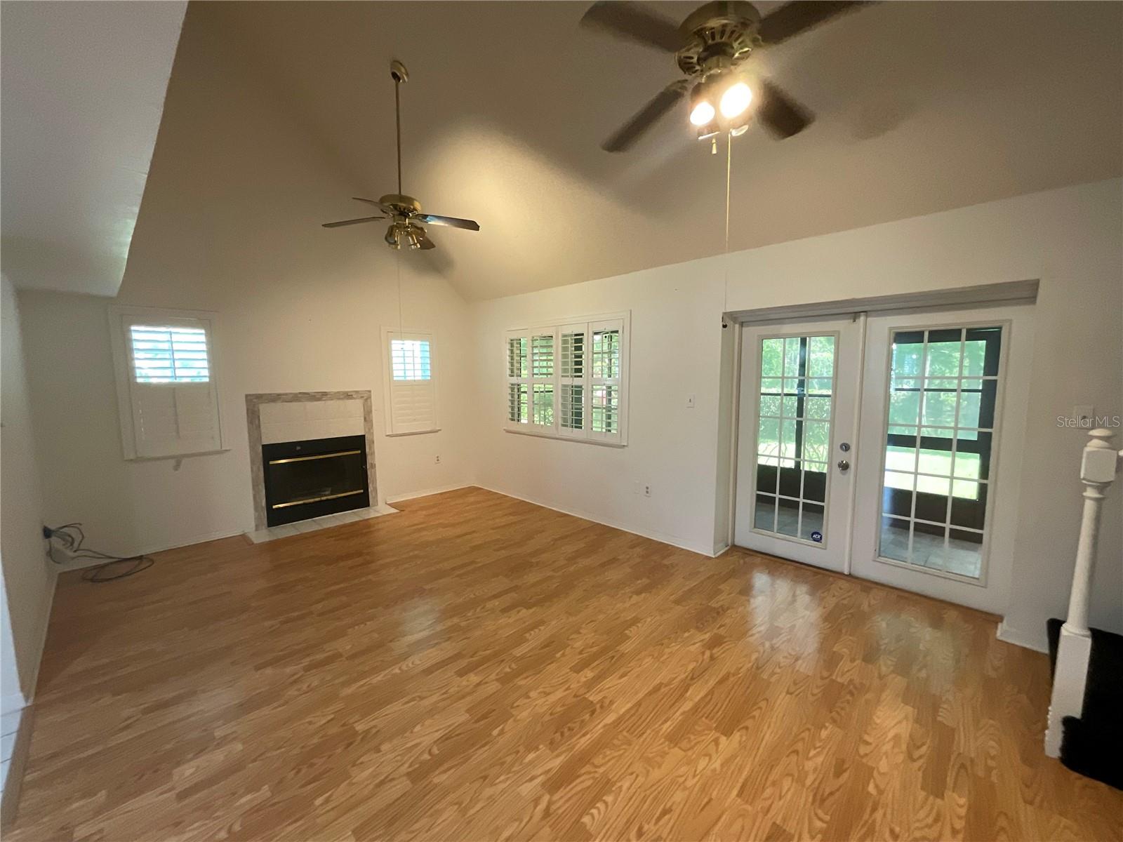 Open Vaulted ceiling living room.