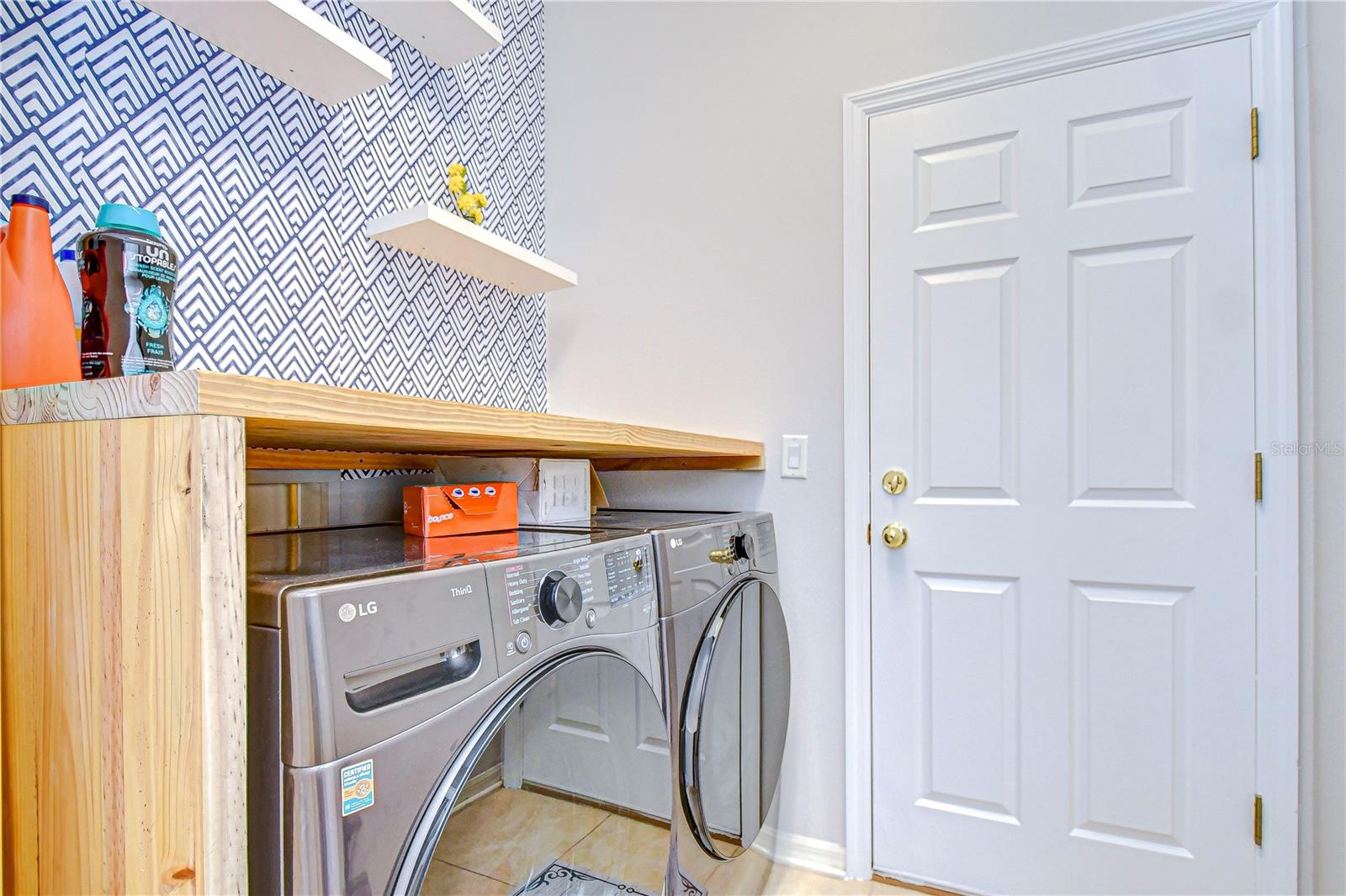 Step into a laundry room that's as stylish as it is functional.