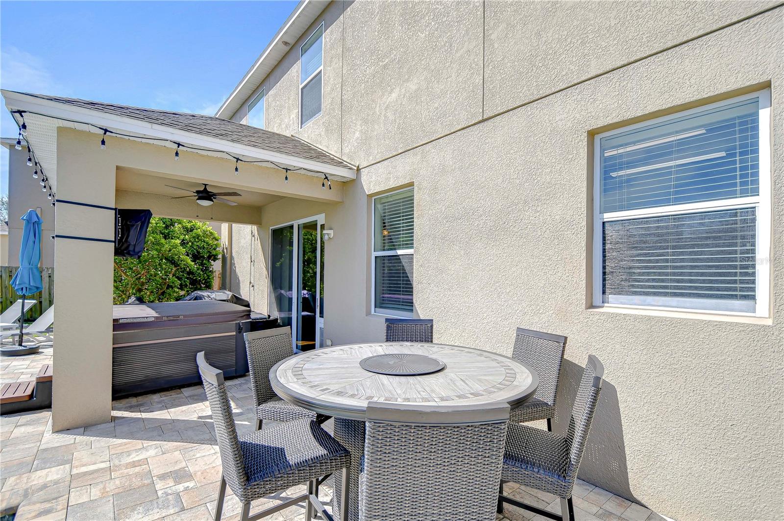 Step into your backyard oasis, ideal for entertaining or relaxing with family.