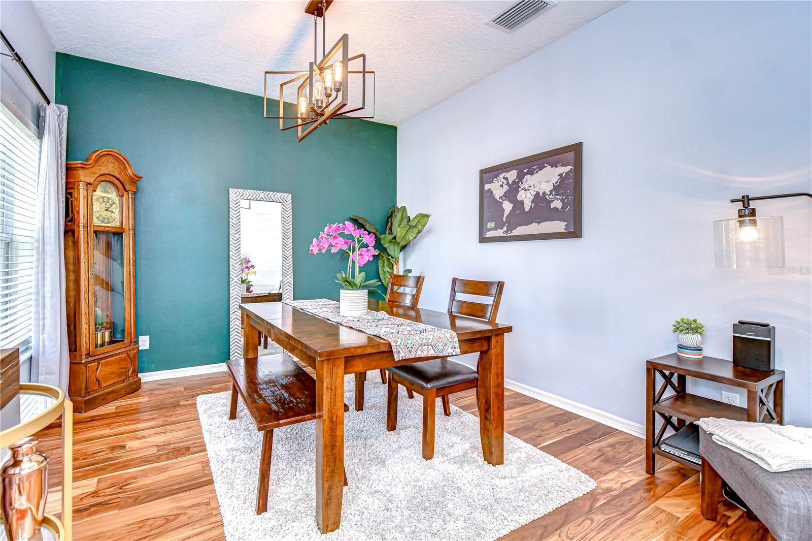 The blend of classic and contemporary elements, creates an inviting ambiance perfect for memorable gatherings.