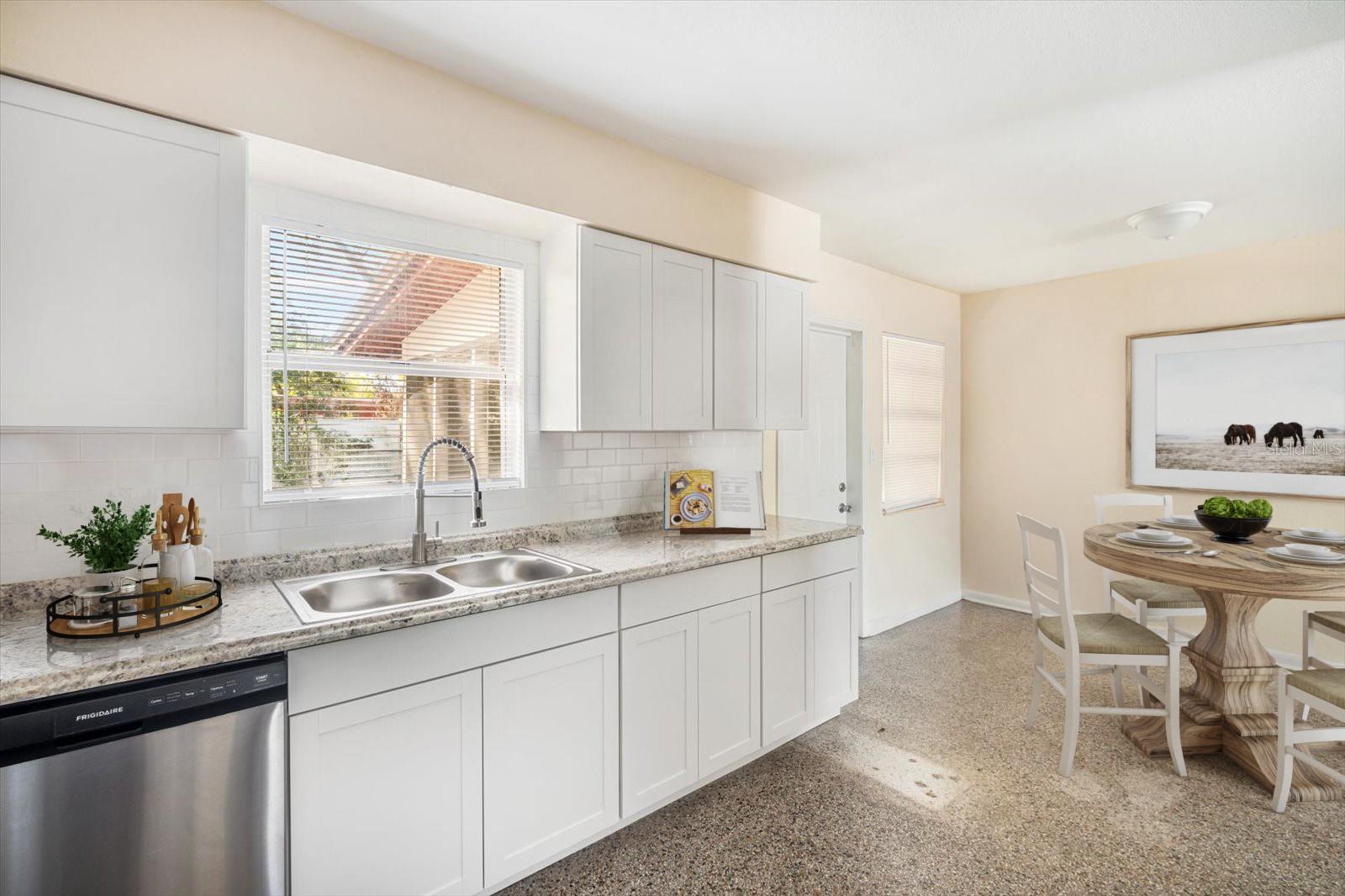 Staged Kitchen and Eating Area