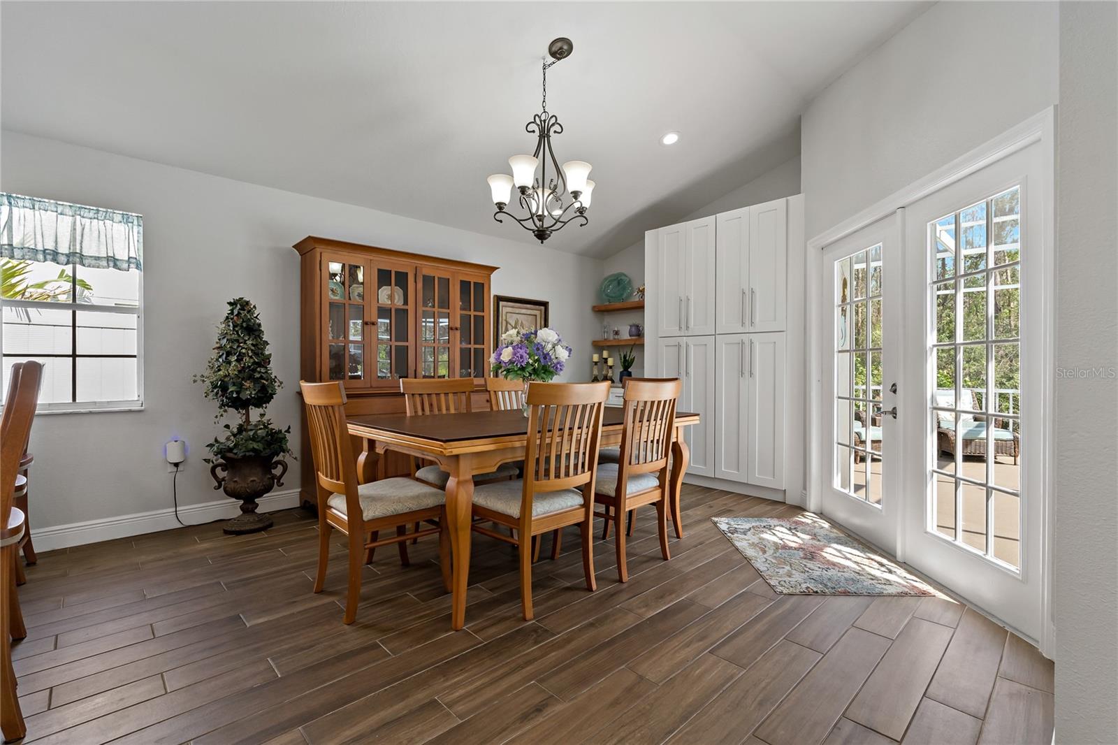 DINING ROOM WITH CUSTOM BUILT PANTRY AND BUFFET