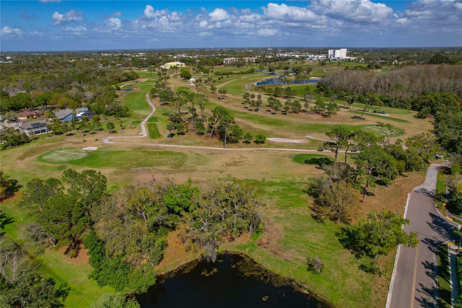 DIRECTLY NEXT TO TARPON SPRINGS GOLF COURSE