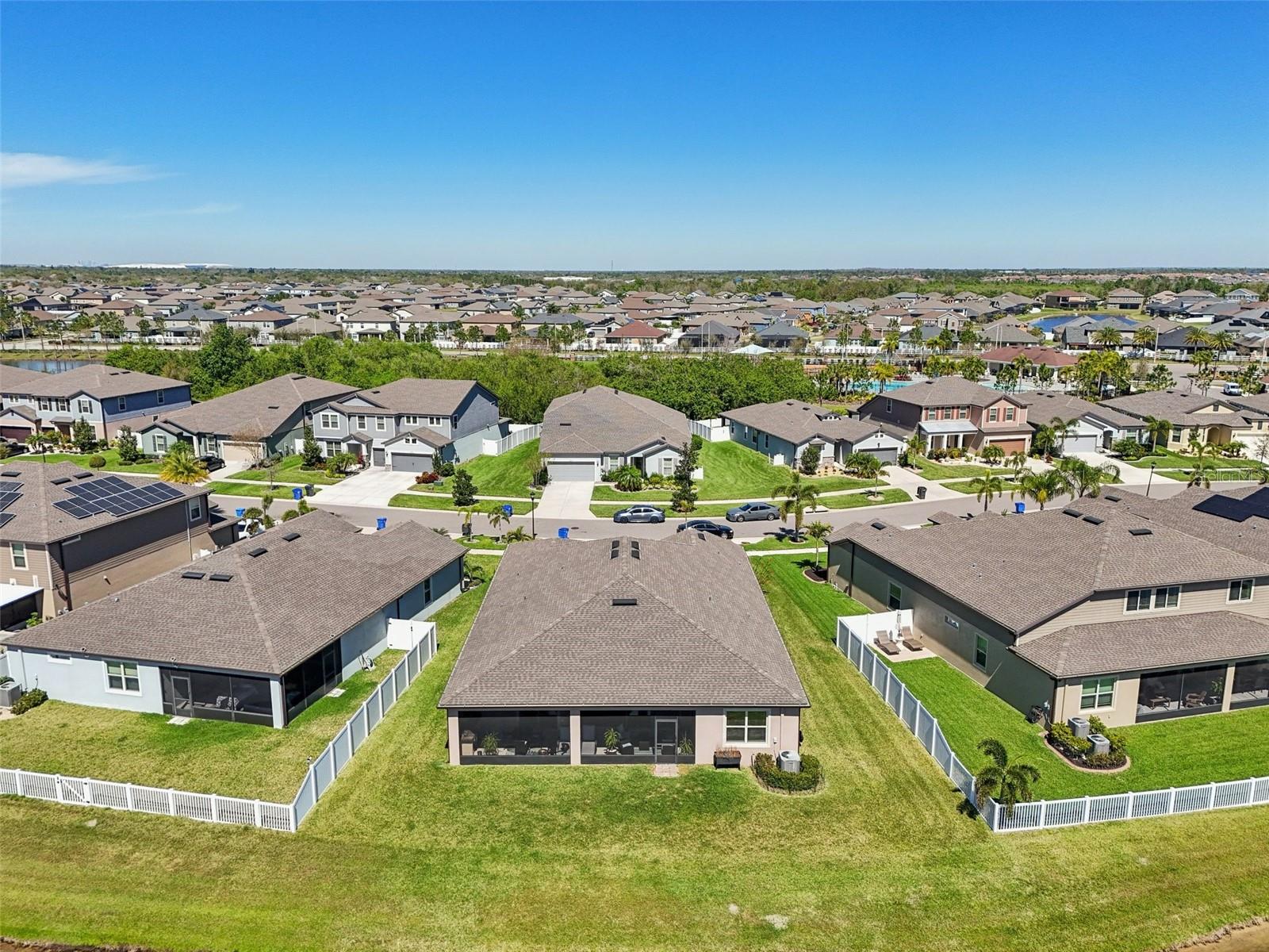 BEAUTIFUL AERIAL VIEW OF BACK YARD-PLENTY OF ROOM FOR A PRIVATE POOL!