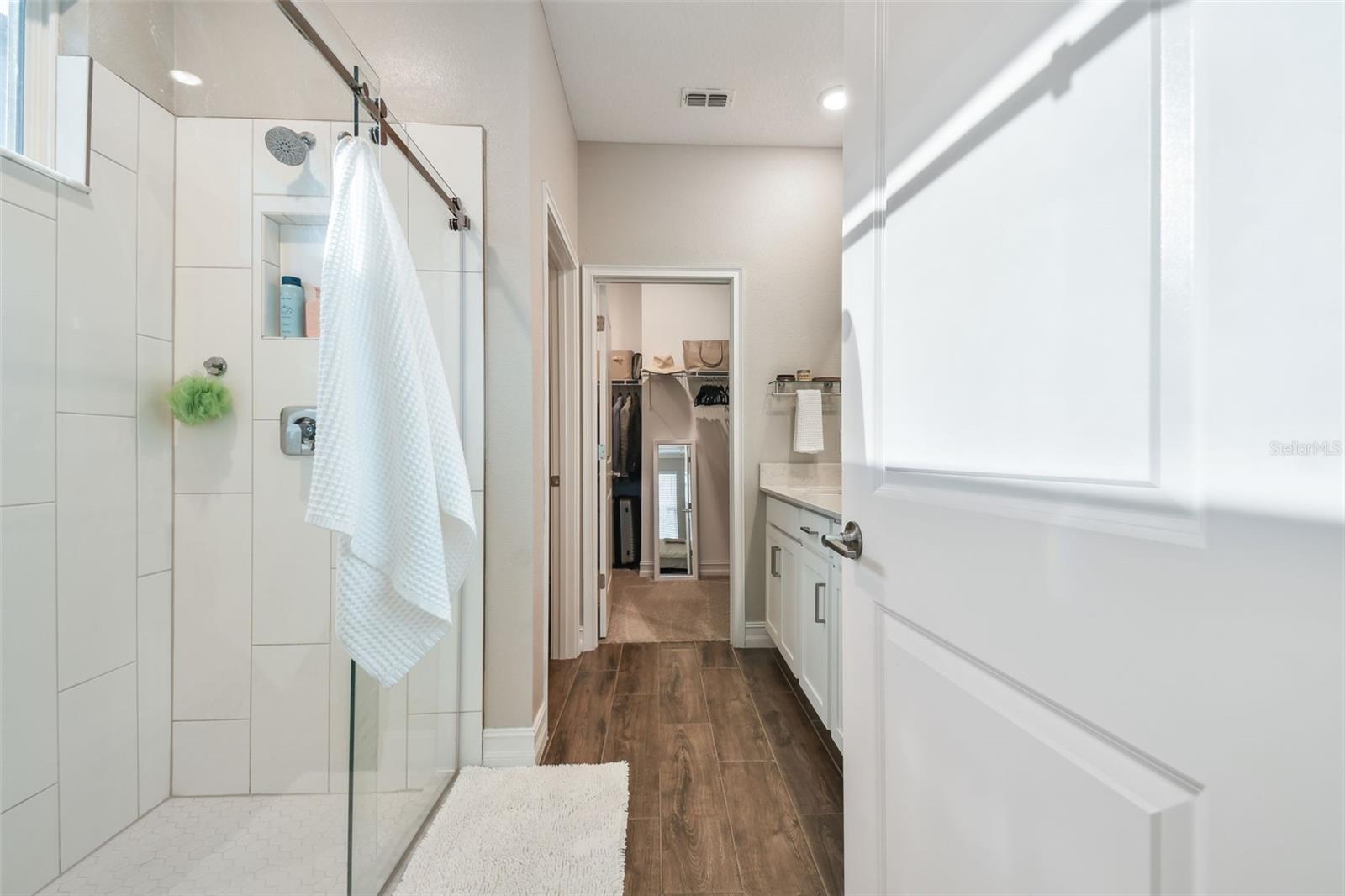 Primary bath has large walk in shower