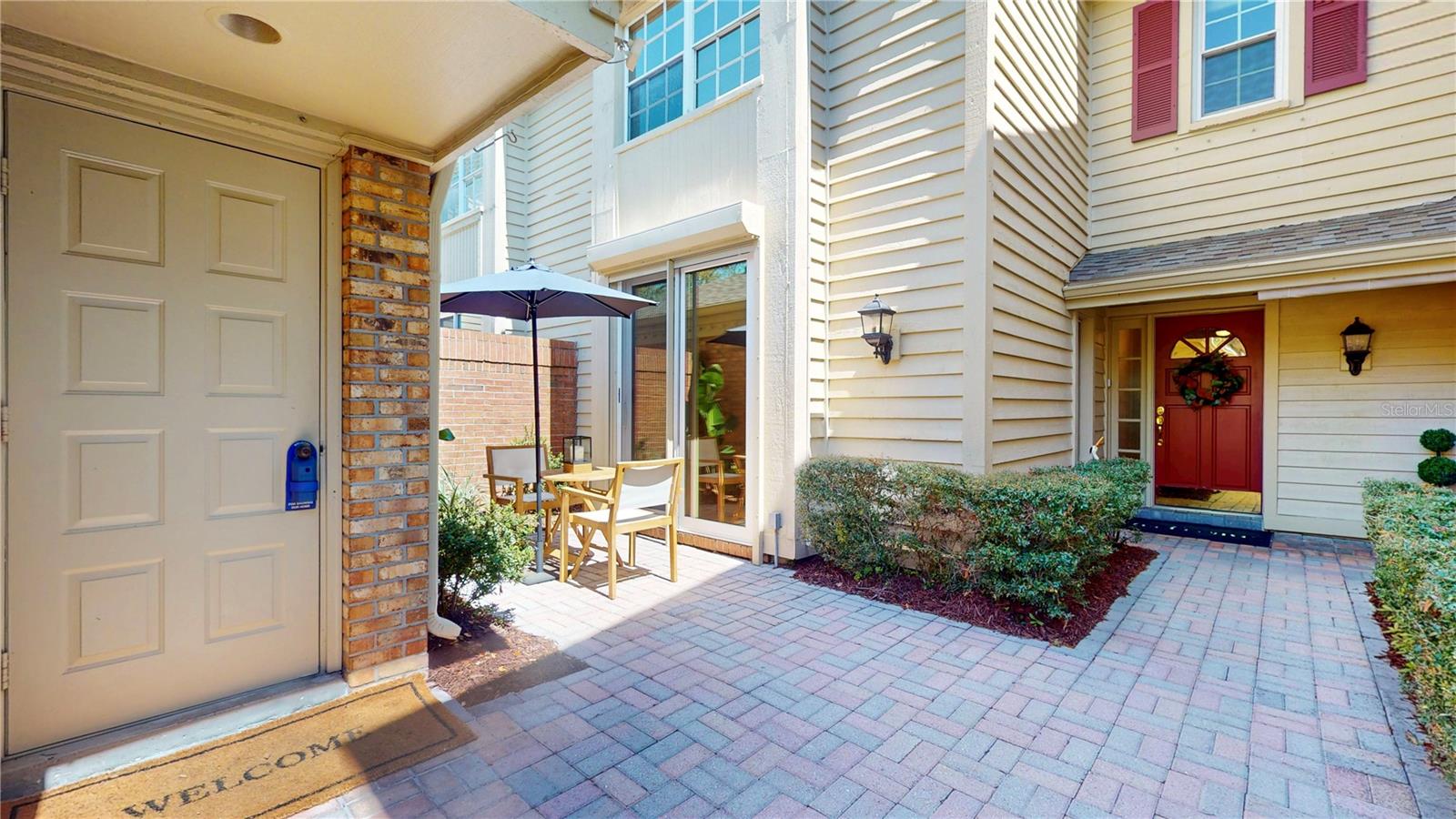 Garage entrance, front door, and front courtyard that can be accessed through the dinette/kitchen sliders.