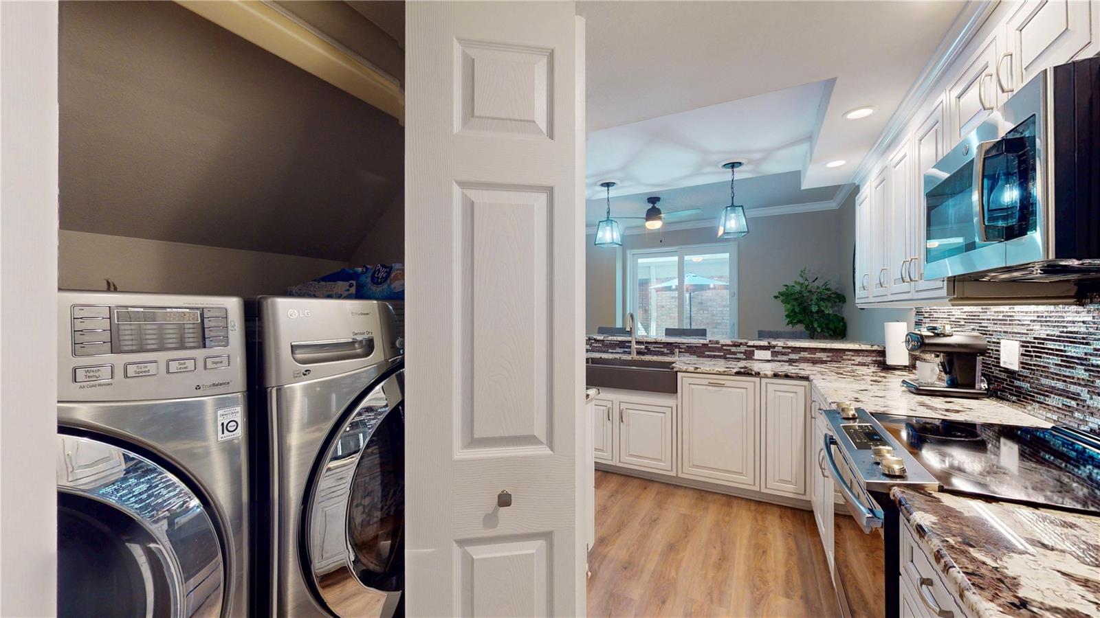 Laundry closet in the kitchen.