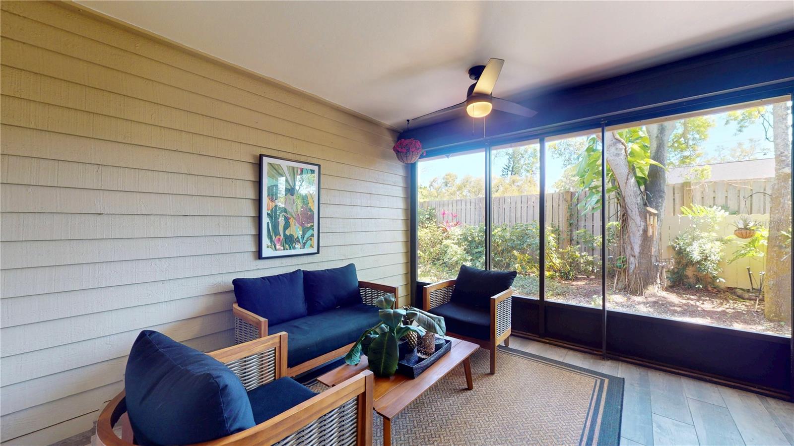 Enclosed back patio with hurricane shutters