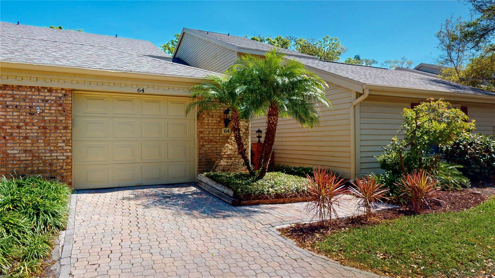 Front drive and garage with nice plants