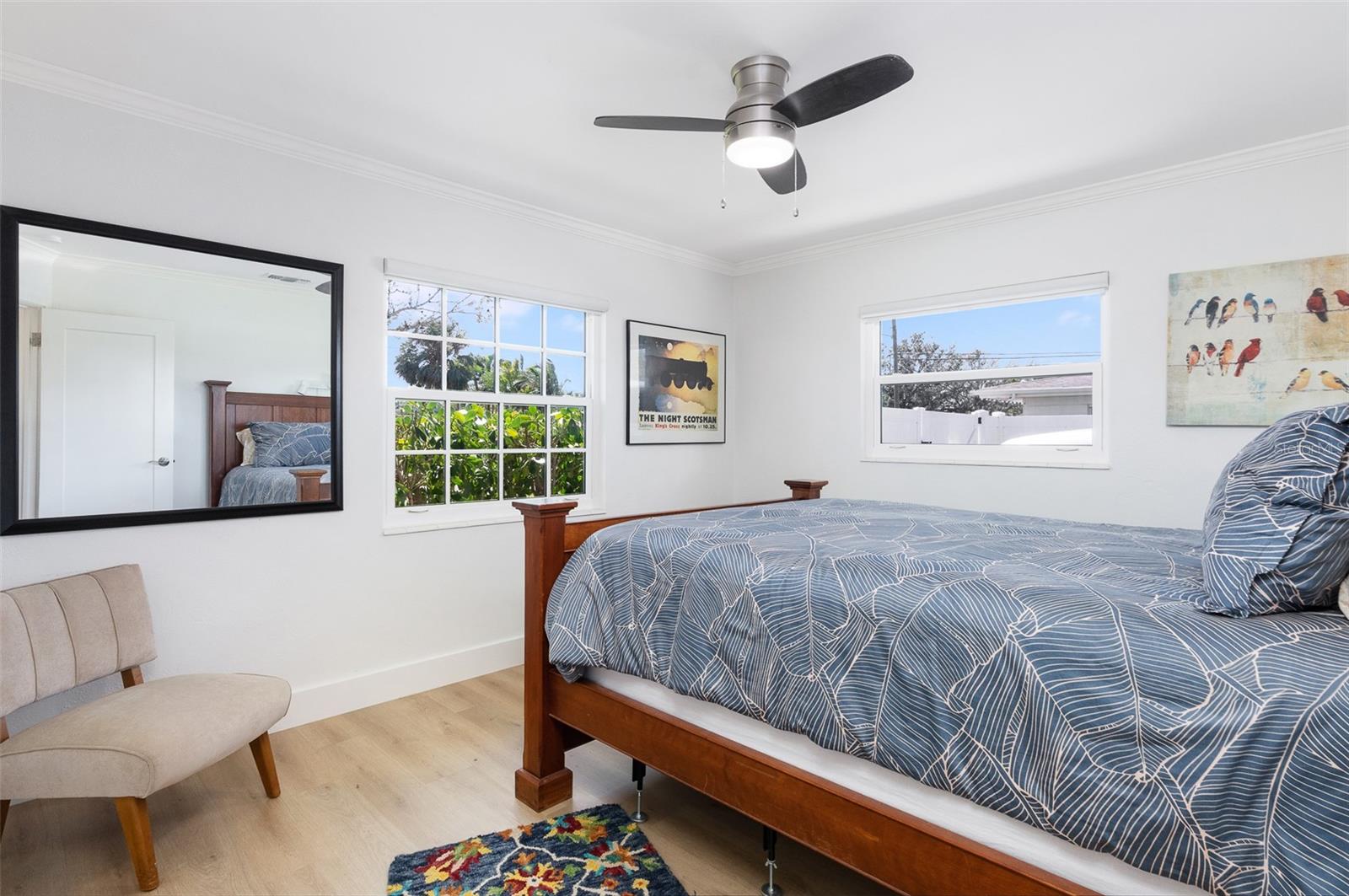 Premier Bedroom with custom blinds including room-darkening