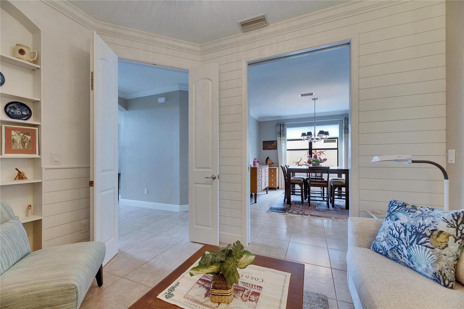 View toward the dining room and hallway from the bonus/sitting room.