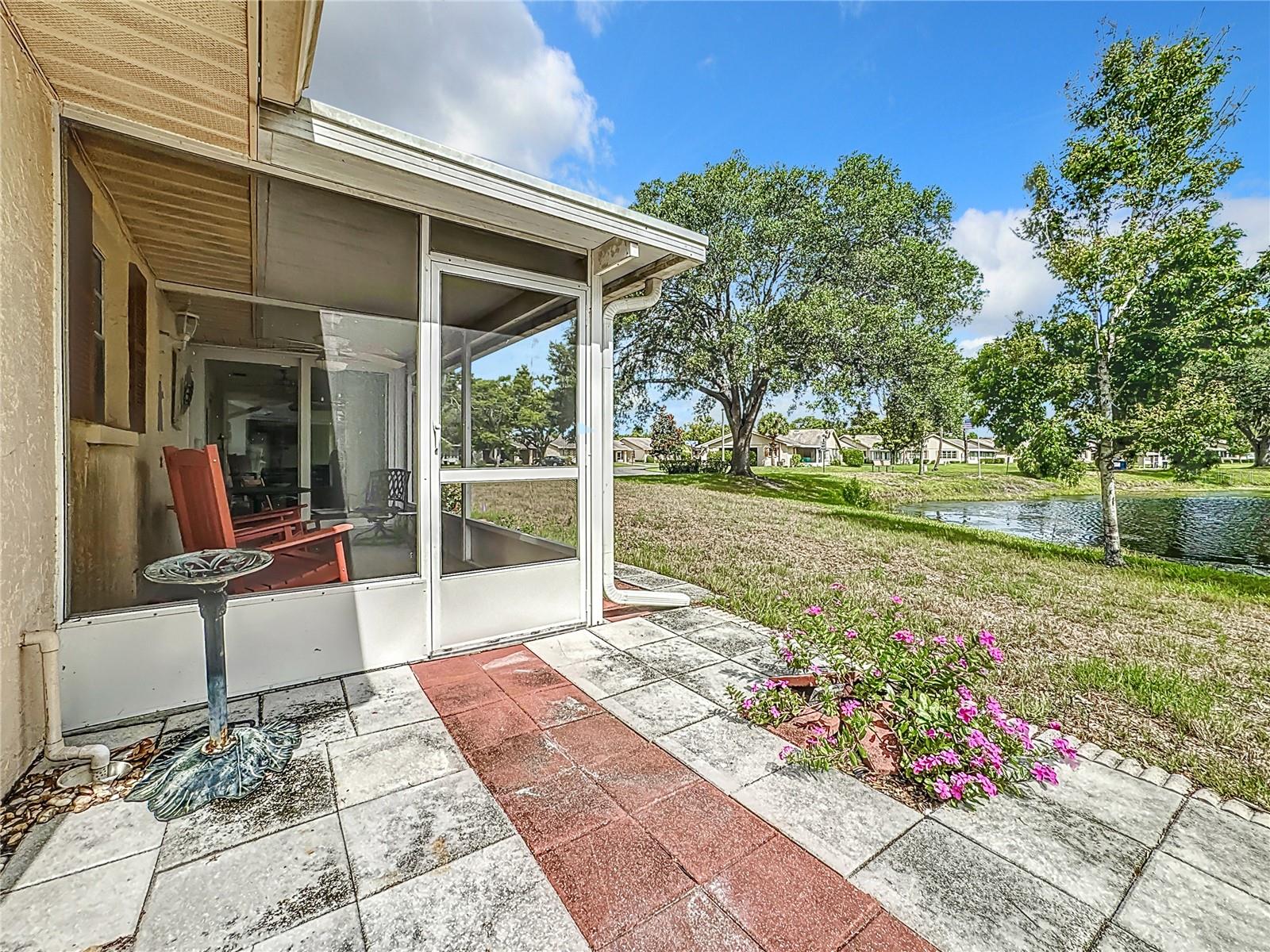 SCREENED PORCH with peaceful water view